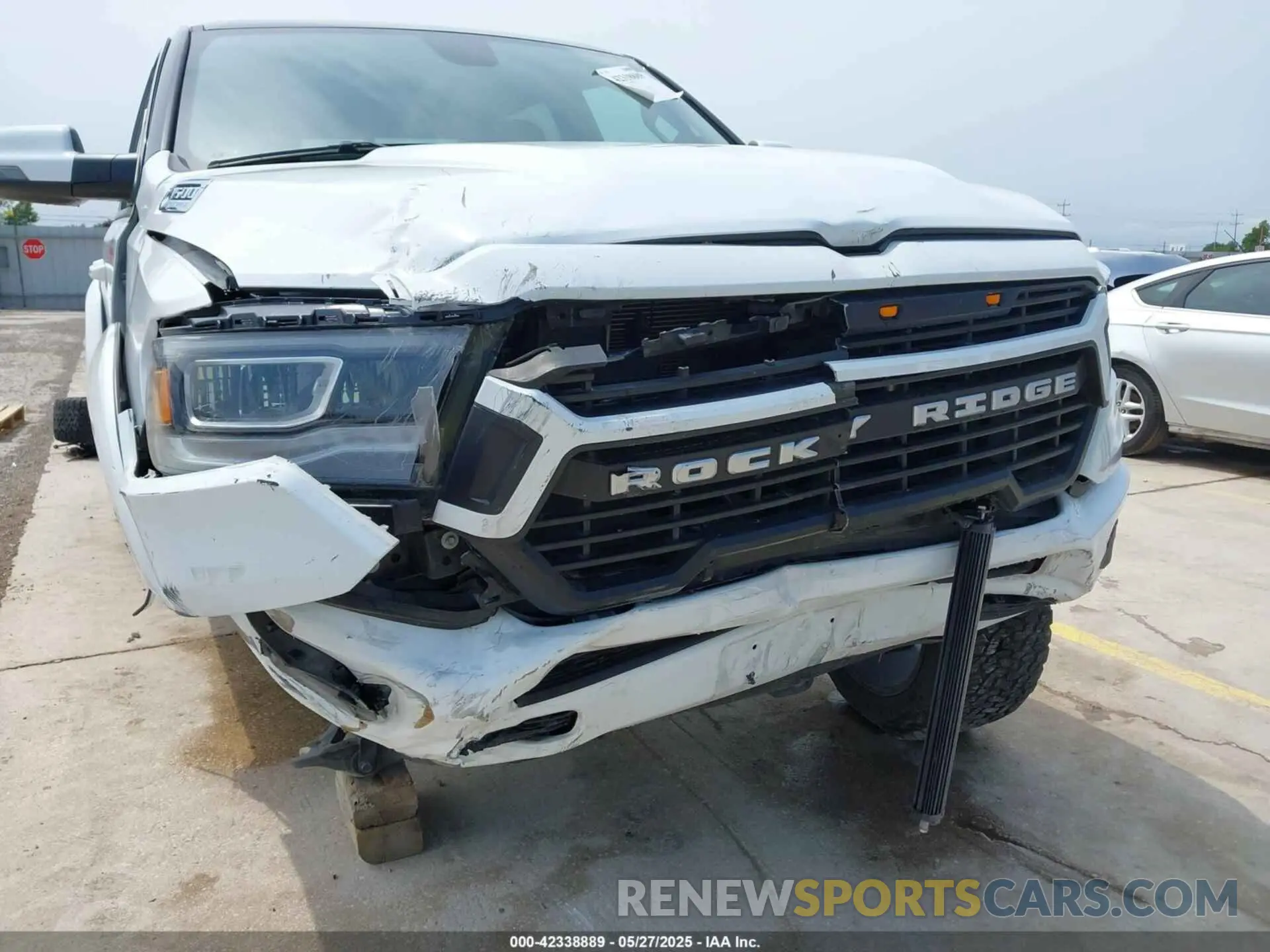 6 Photograph of a damaged car 1C6SRFFT8PN533415 RAM 1500 2023