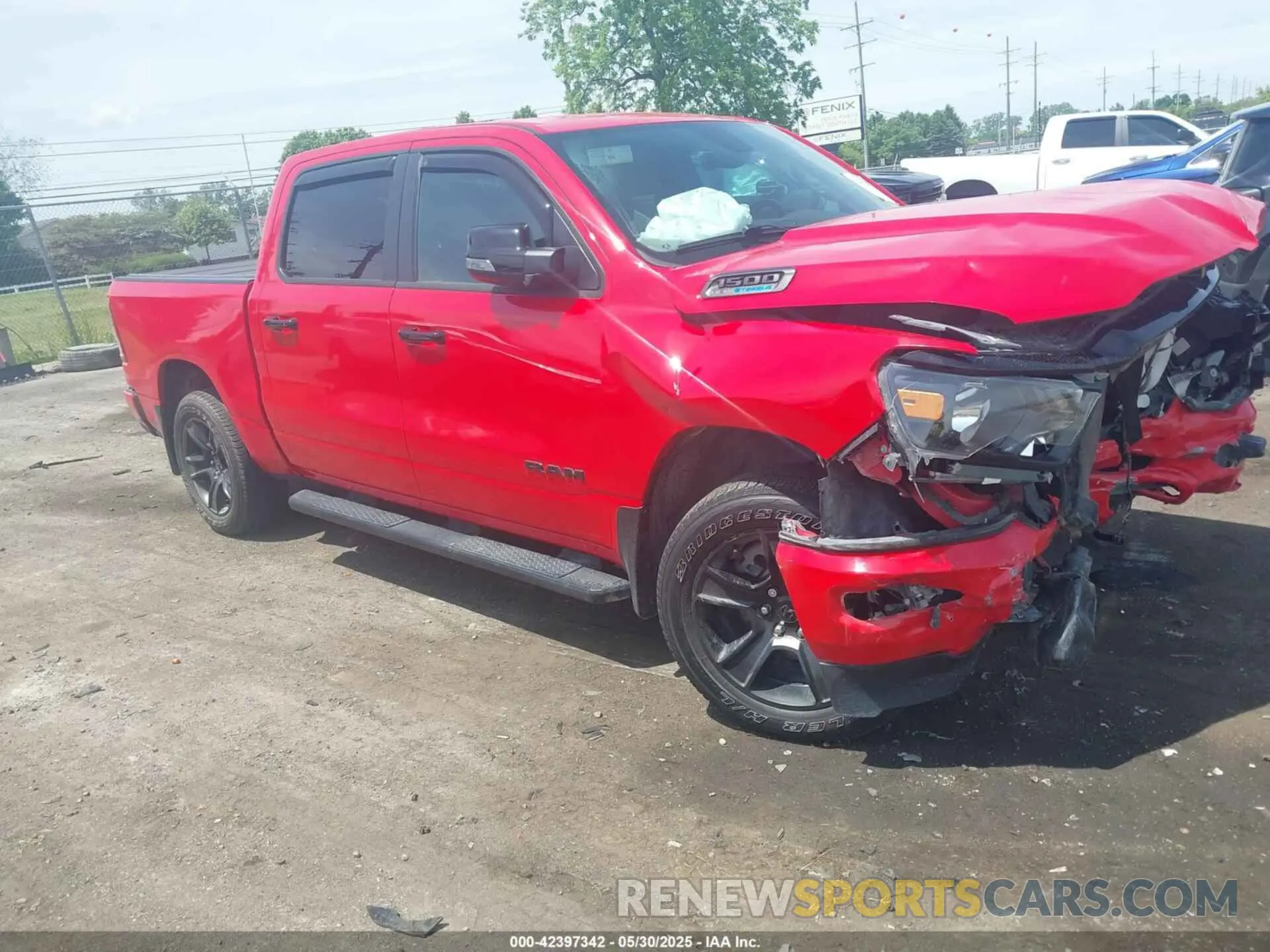 1 Photograph of a damaged car 1C6SRFFT9PN509690 RAM 1500 2023
