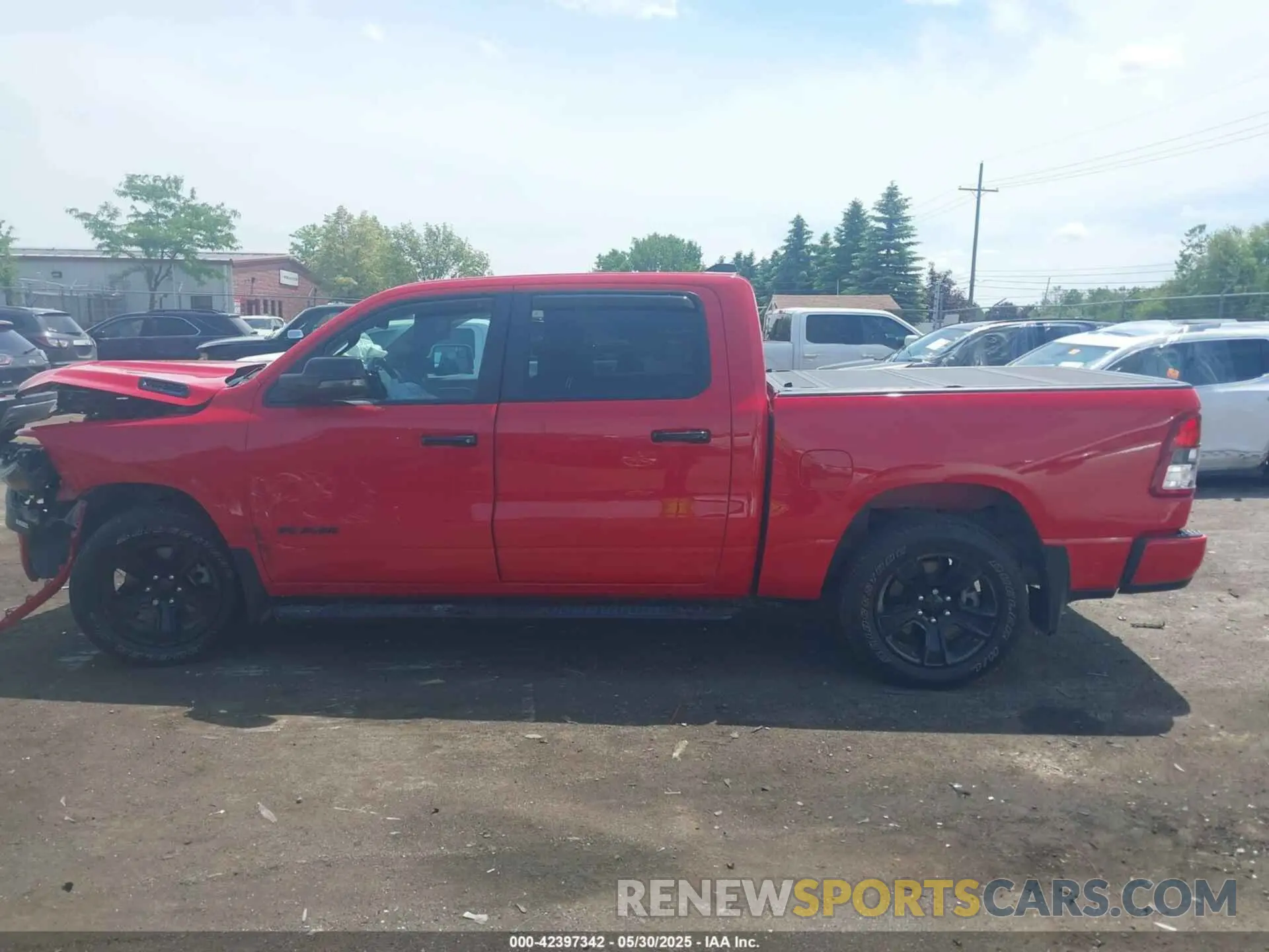 14 Photograph of a damaged car 1C6SRFFT9PN509690 RAM 1500 2023