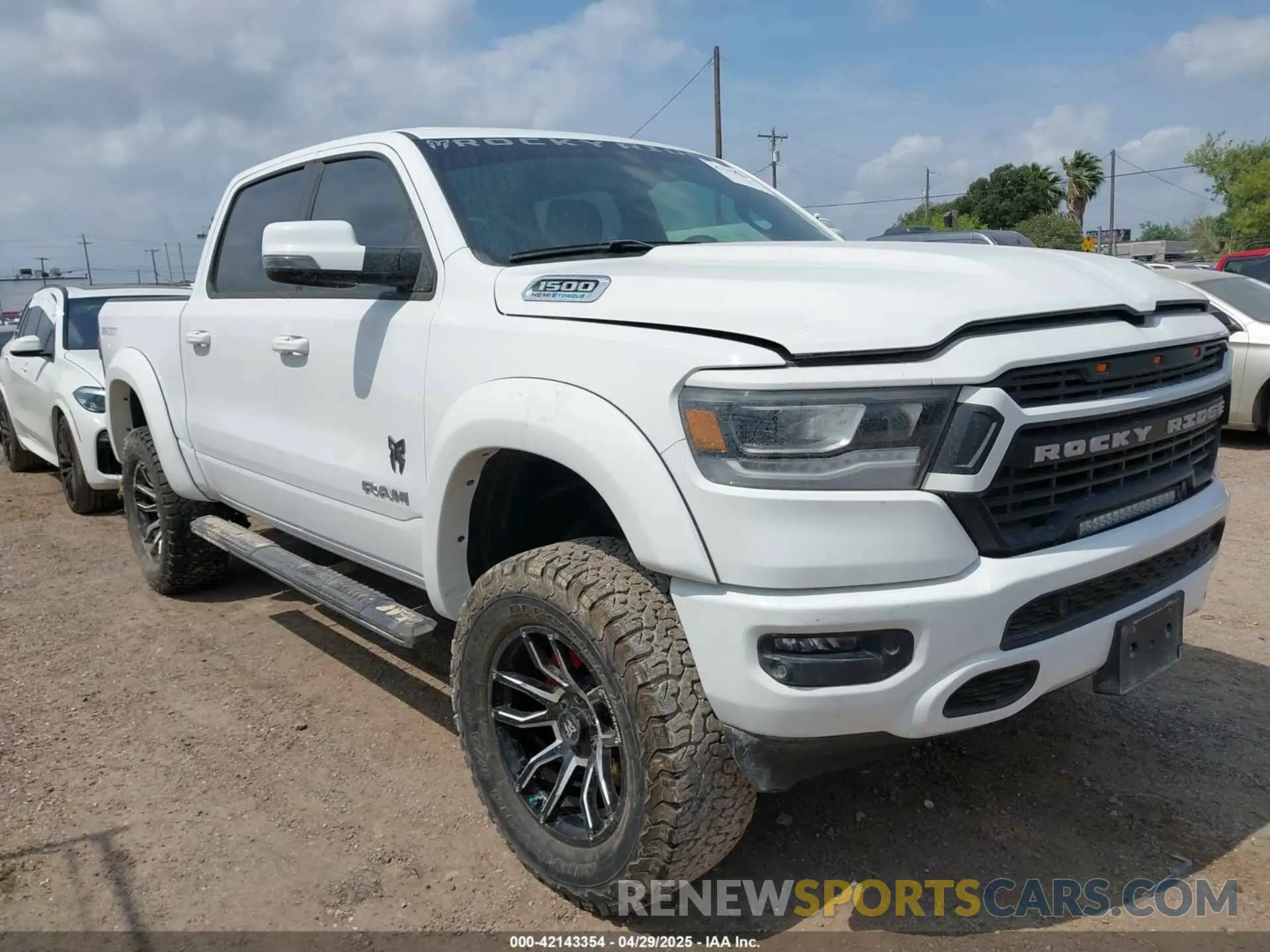 1 Photograph of a damaged car 1C6SRFFT9PN533410 RAM 1500 2023