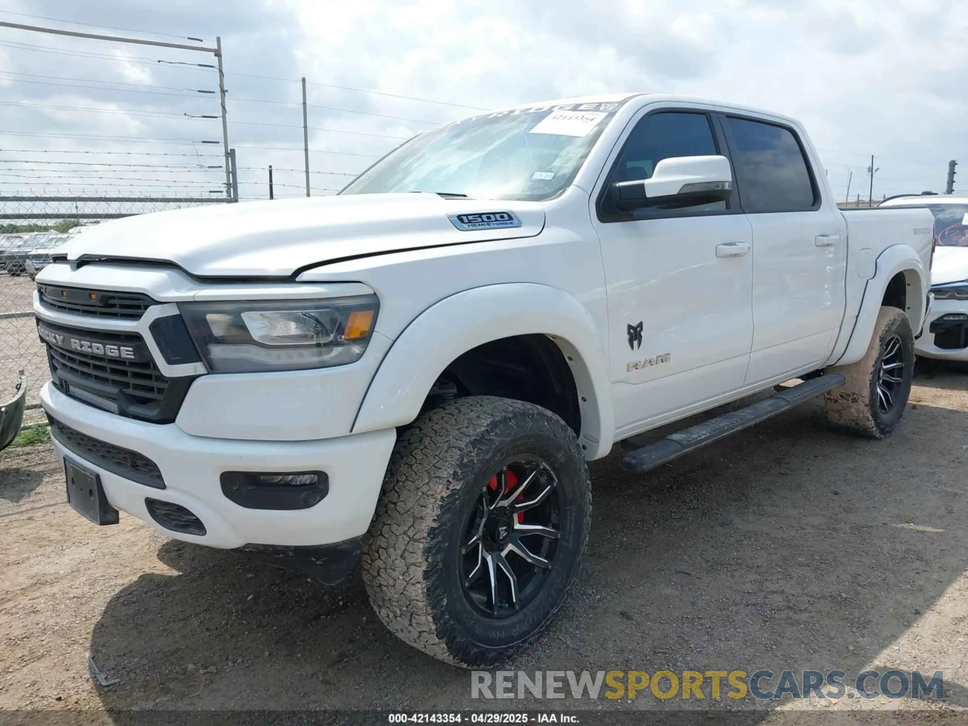 2 Photograph of a damaged car 1C6SRFFT9PN533410 RAM 1500 2023