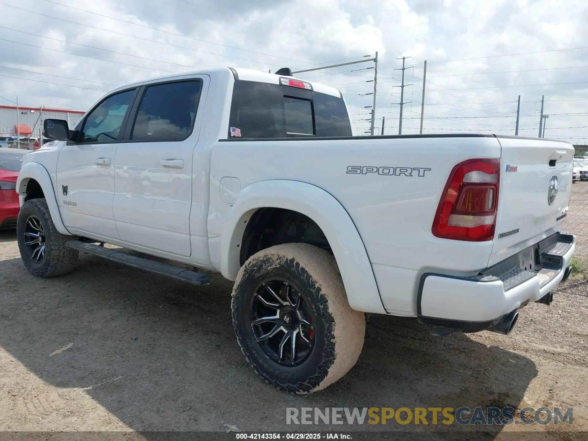 3 Photograph of a damaged car 1C6SRFFT9PN533410 RAM 1500 2023