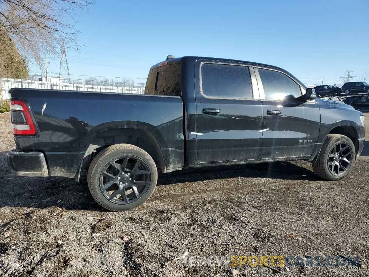 3 Photograph of a damaged car 1C6SRFFT9PN626895 RAM 1500 2023