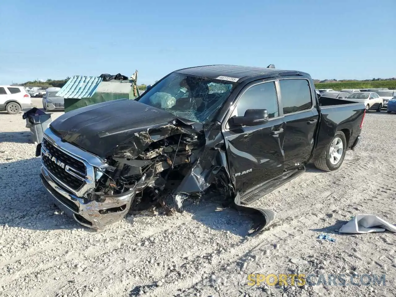 1 Photograph of a damaged car 1C6SRFFT9PN661792 RAM 1500 2023