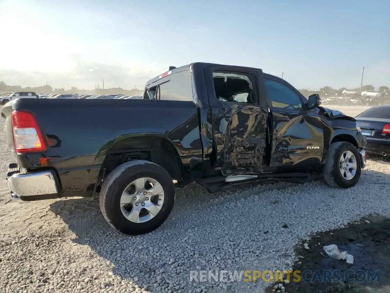 3 Photograph of a damaged car 1C6SRFFT9PN661792 RAM 1500 2023