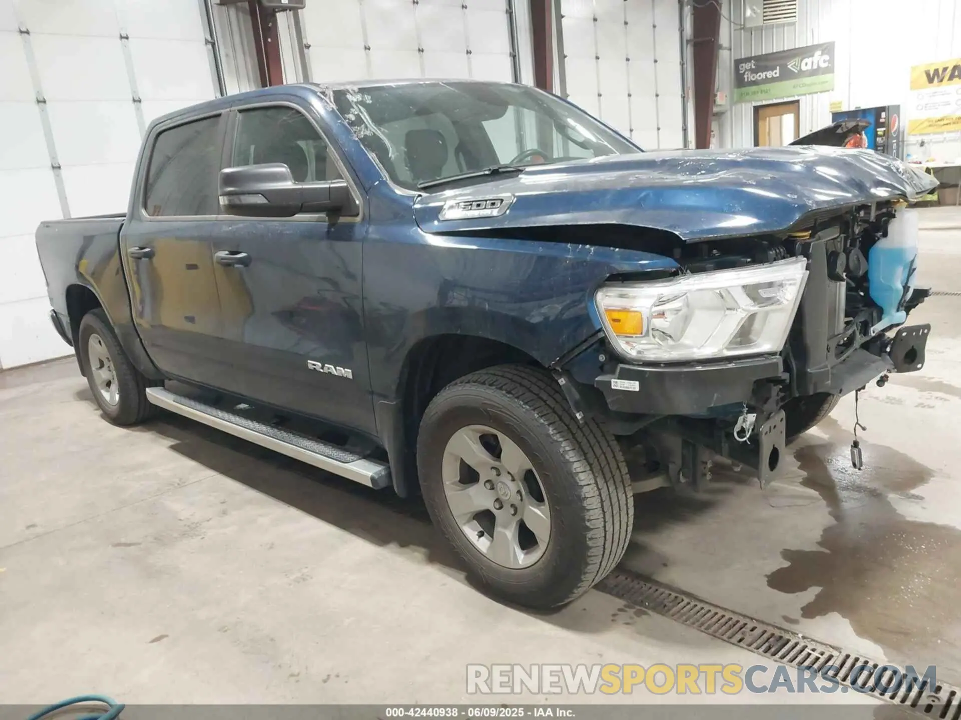 1 Photograph of a damaged car 1C6SRFFT9PN685512 RAM 1500 2023