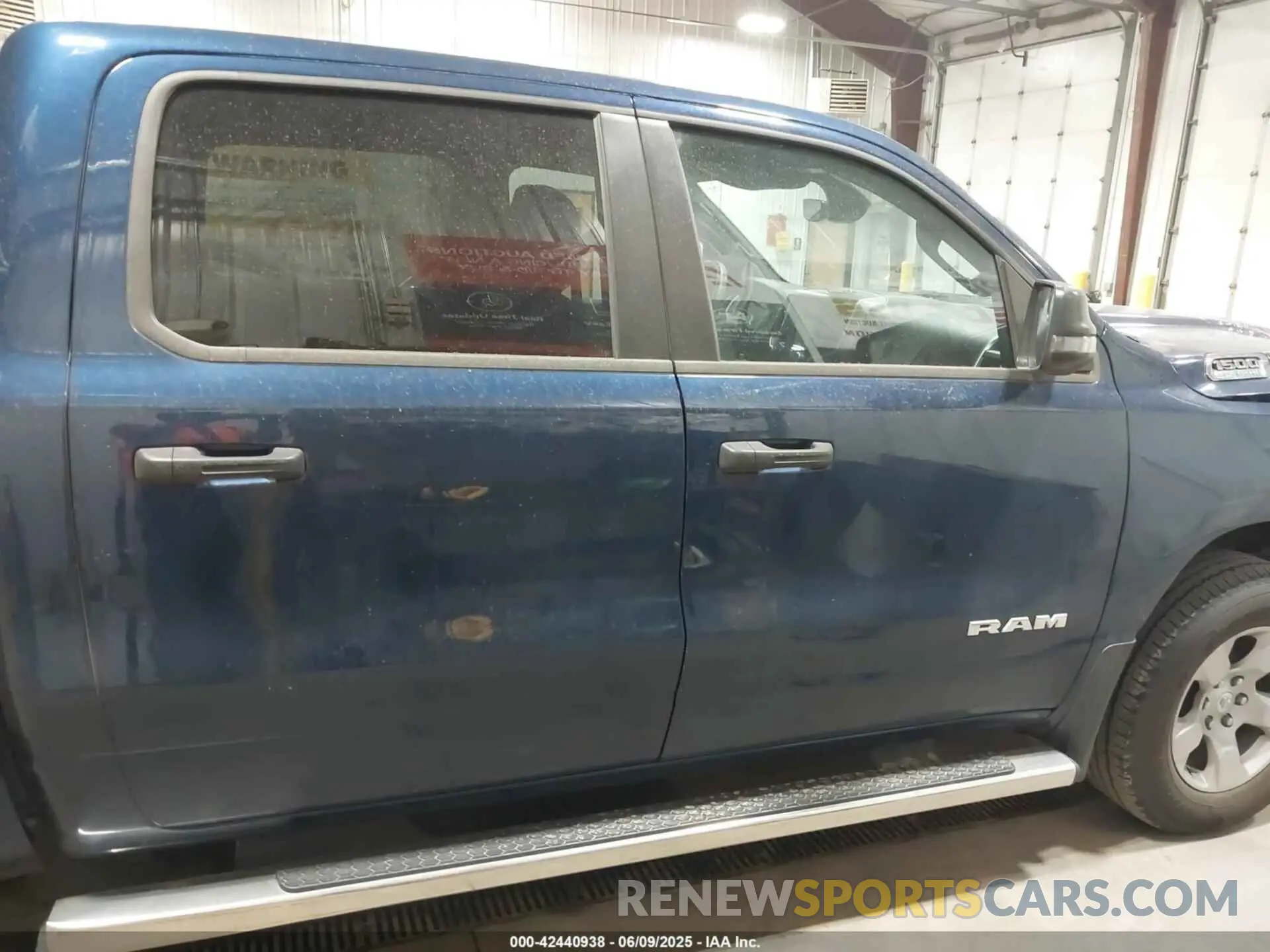 14 Photograph of a damaged car 1C6SRFFT9PN685512 RAM 1500 2023