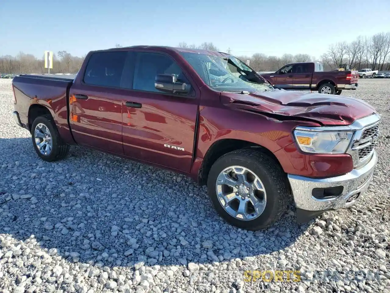 4 Photograph of a damaged car 1C6SRFFT9PN687860 RAM 1500 2023