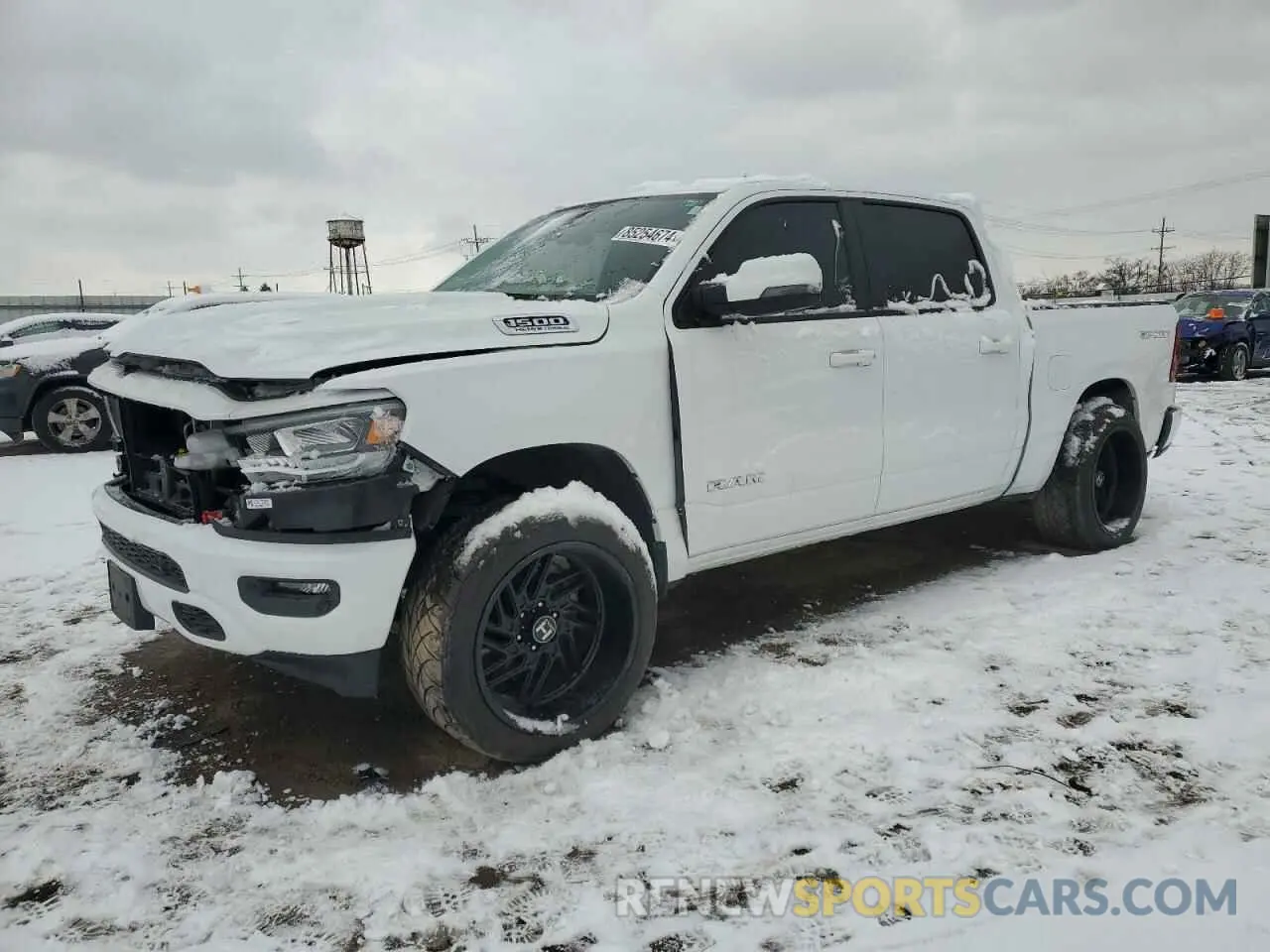 1 Photograph of a damaged car 1C6SRFFT9PN704849 RAM 1500 2023