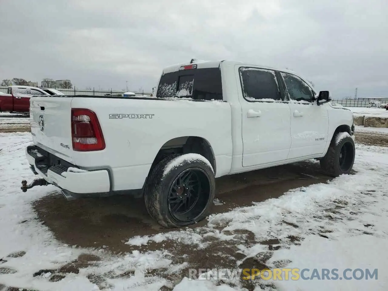 3 Photograph of a damaged car 1C6SRFFT9PN704849 RAM 1500 2023