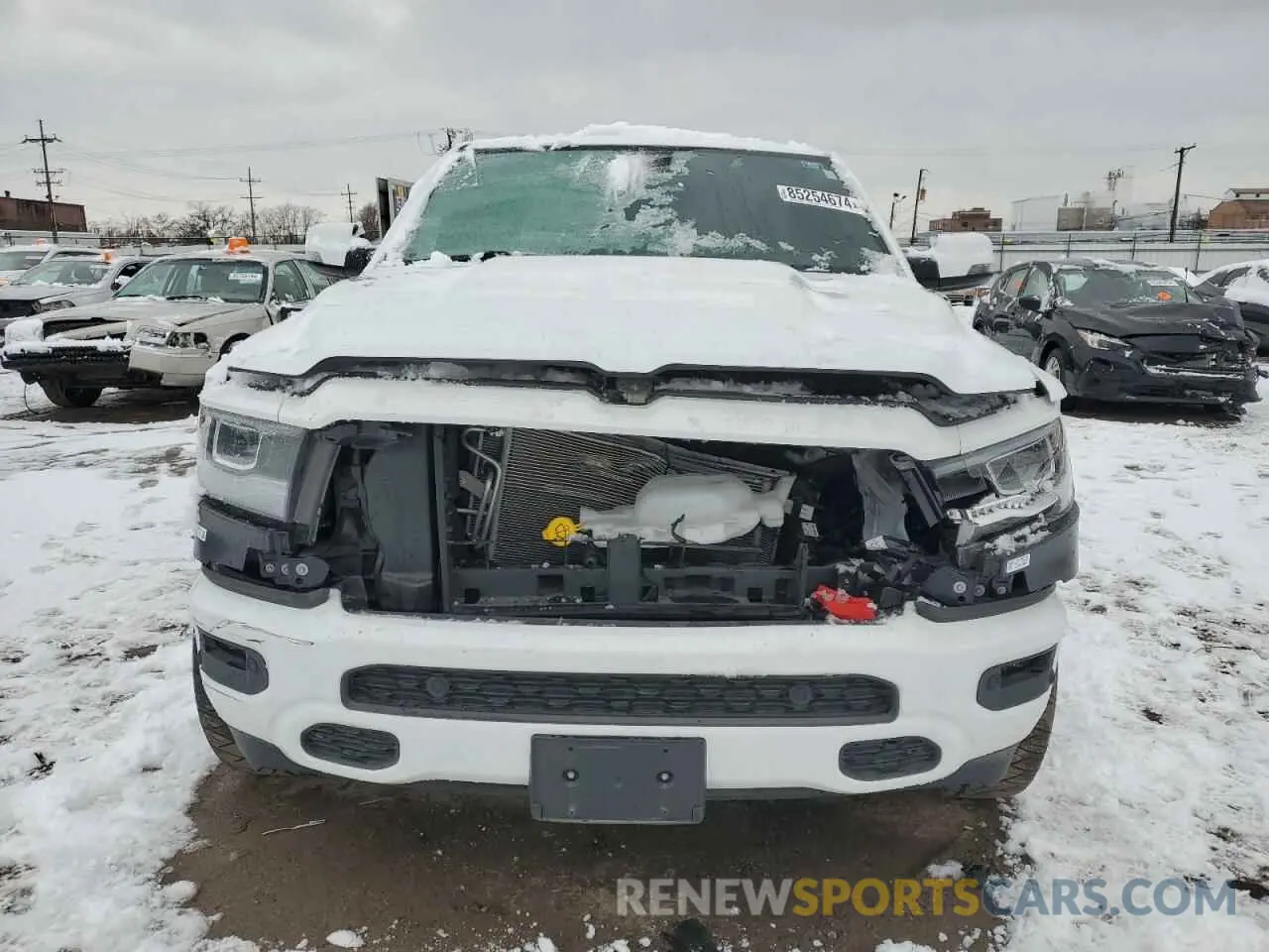 5 Photograph of a damaged car 1C6SRFFT9PN704849 RAM 1500 2023