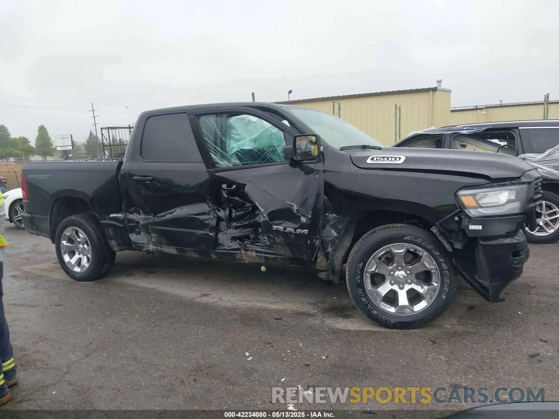 13 Photograph of a damaged car 1C6SRFFTXPN679086 RAM 1500 2023