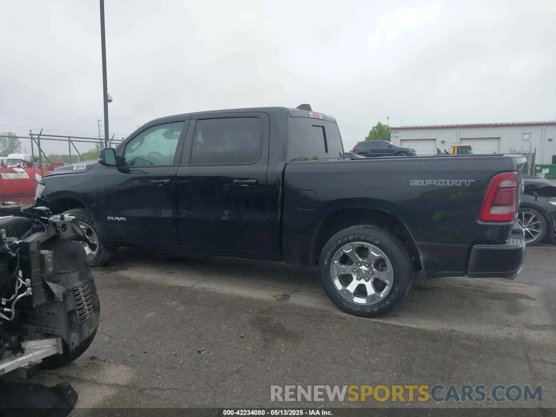 14 Photograph of a damaged car 1C6SRFFTXPN679086 RAM 1500 2023