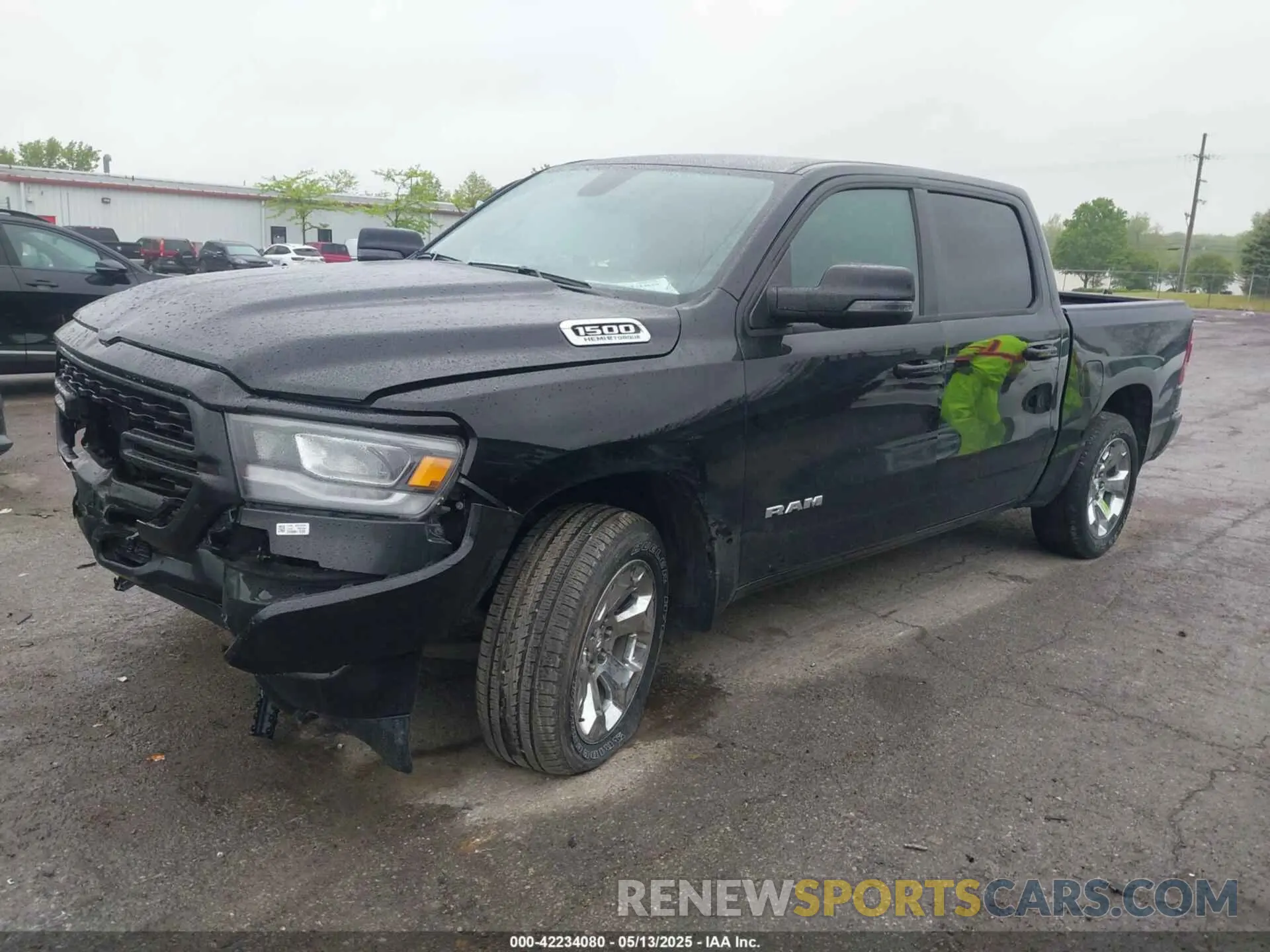 2 Photograph of a damaged car 1C6SRFFTXPN679086 RAM 1500 2023