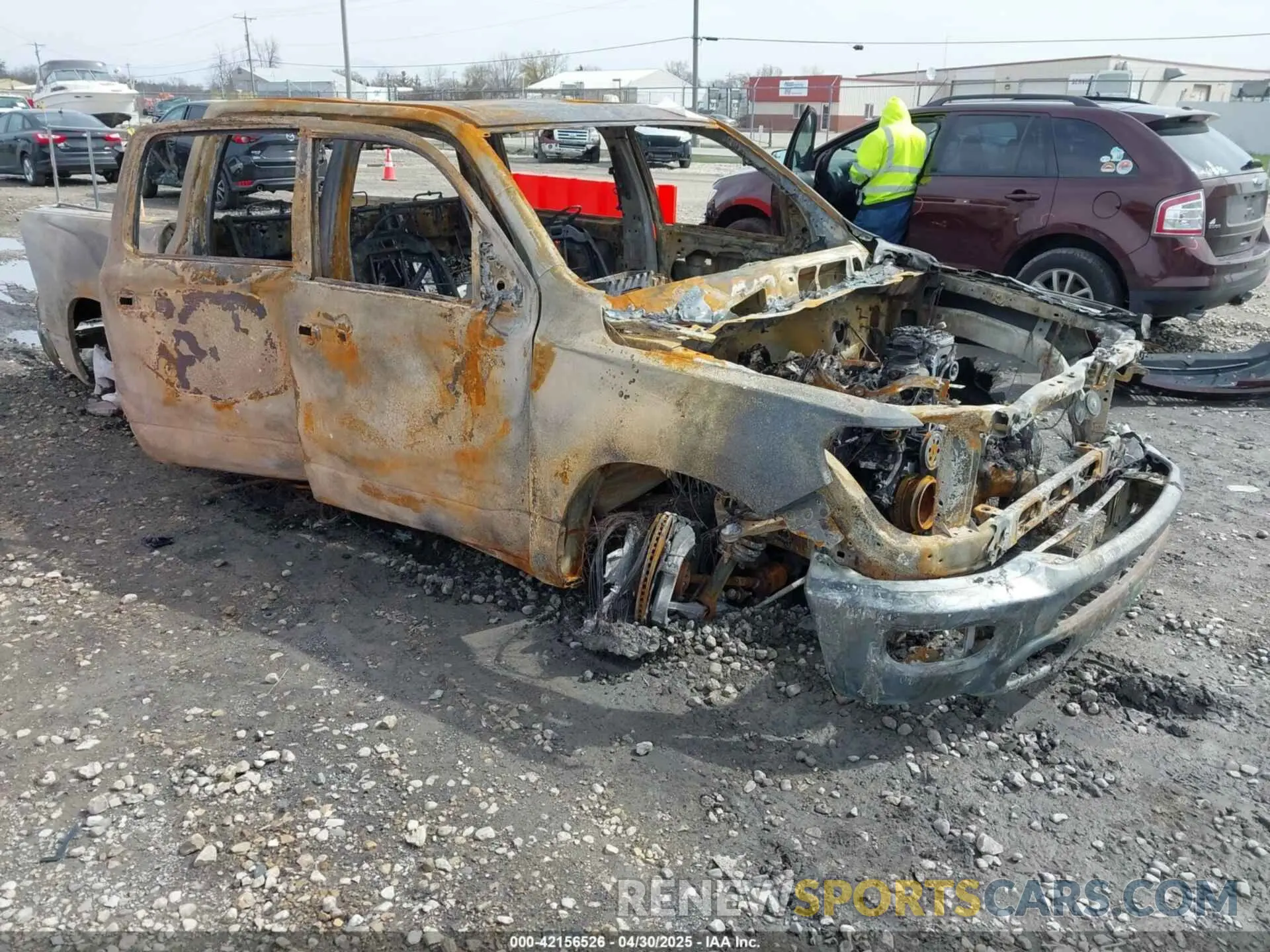 1 Photograph of a damaged car 1C6SRFFTXPN696583 RAM 1500 2023