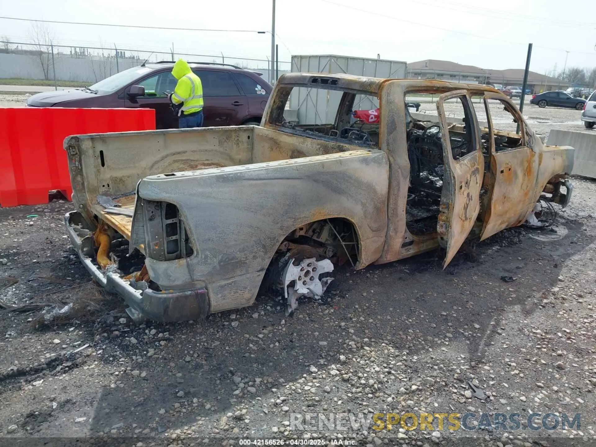 4 Photograph of a damaged car 1C6SRFFTXPN696583 RAM 1500 2023