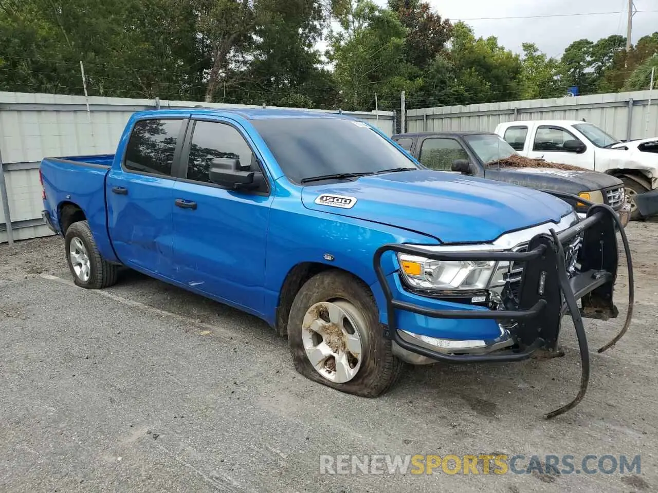 4 Photograph of a damaged car 1C6SRFGT1PN666130 RAM 1500 2023