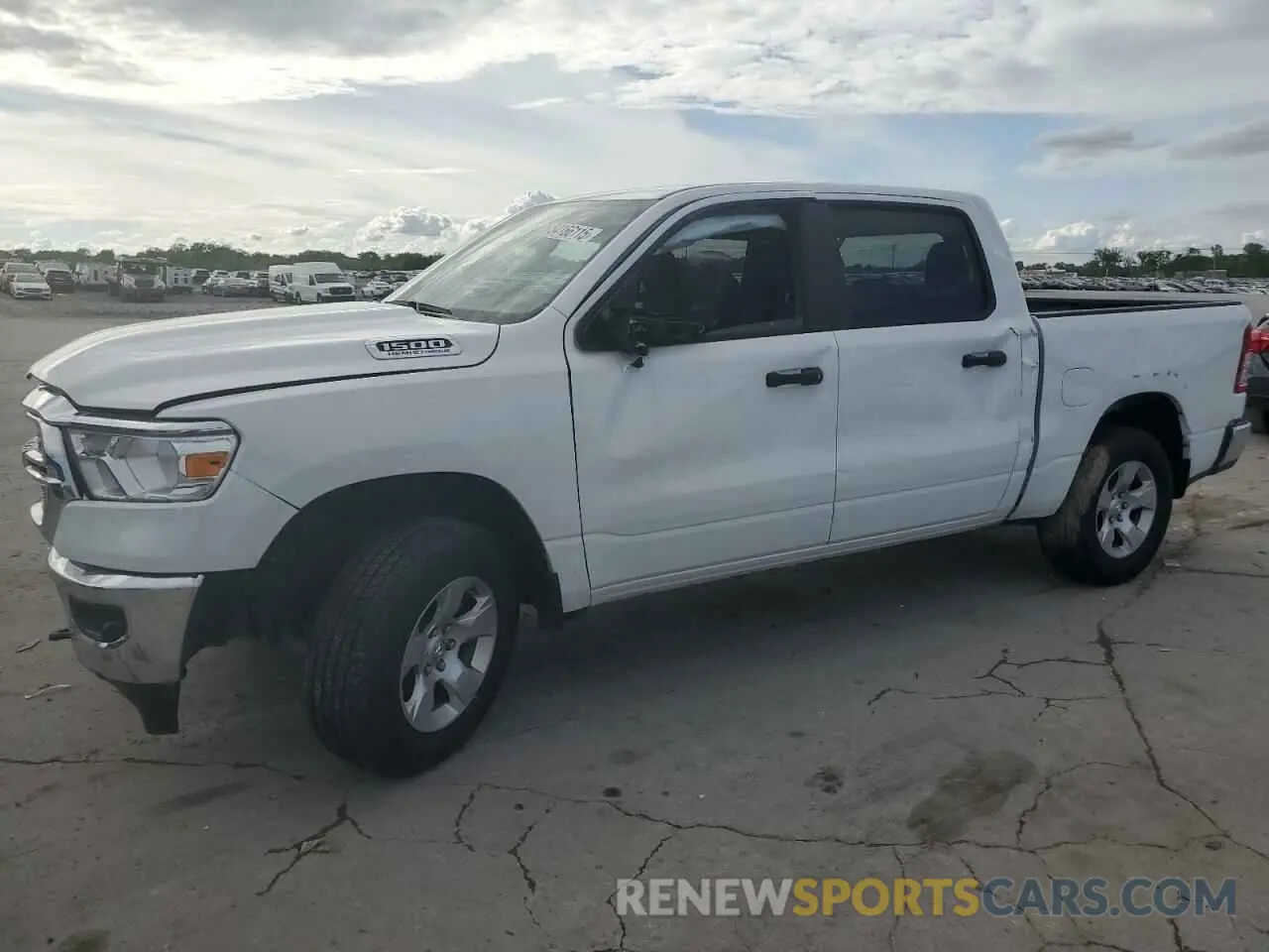 1 Photograph of a damaged car 1C6SRFGT1PN696163 RAM 1500 2023