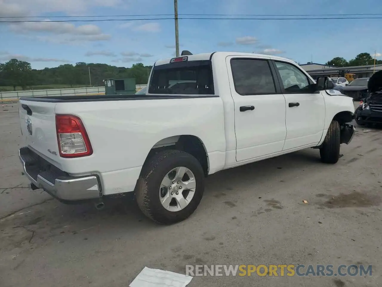 3 Photograph of a damaged car 1C6SRFGT1PN696163 RAM 1500 2023