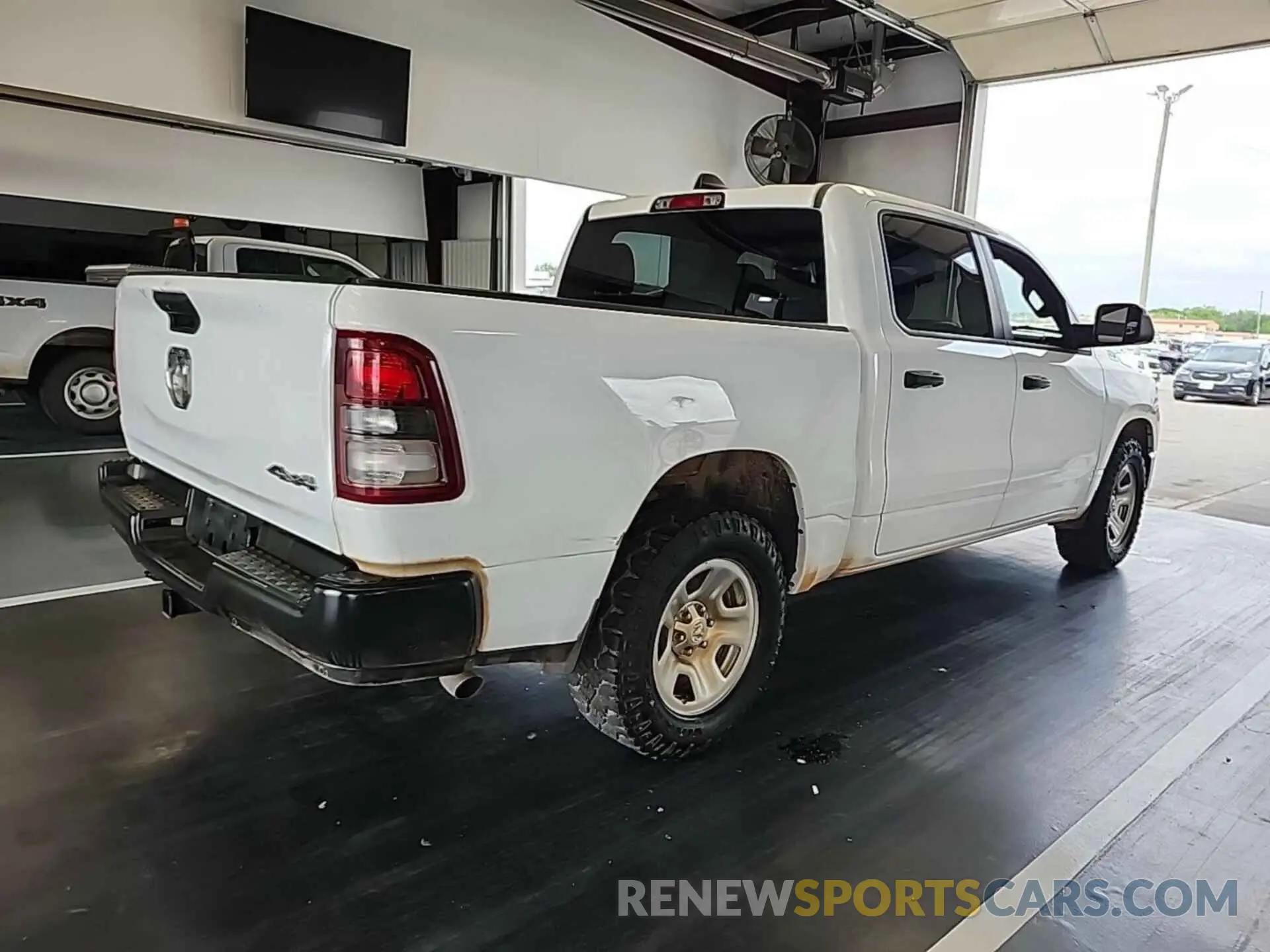 12 Photograph of a damaged car 1C6SRFGT2PN560947 RAM 1500 2023