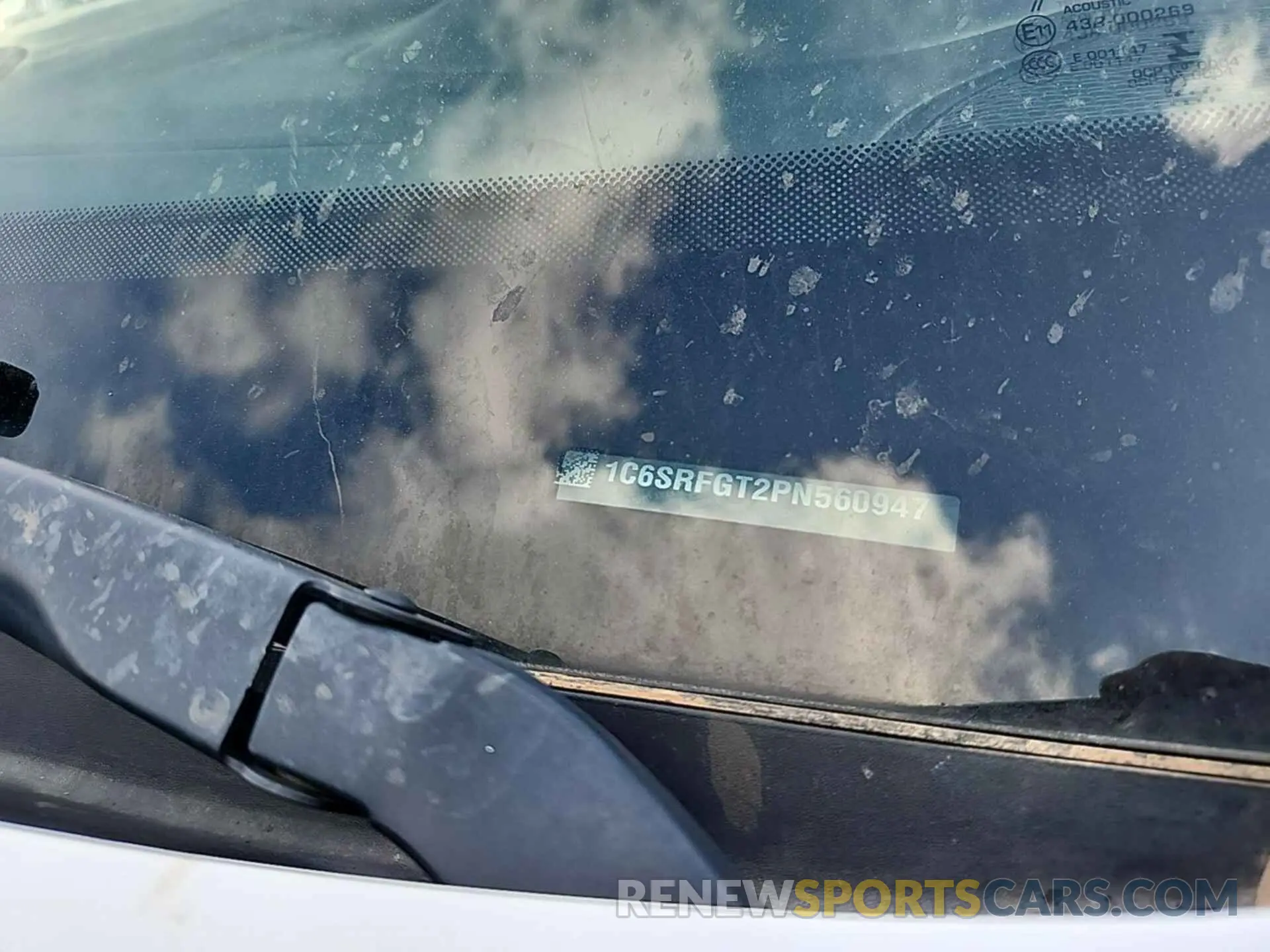 13 Photograph of a damaged car 1C6SRFGT2PN560947 RAM 1500 2023