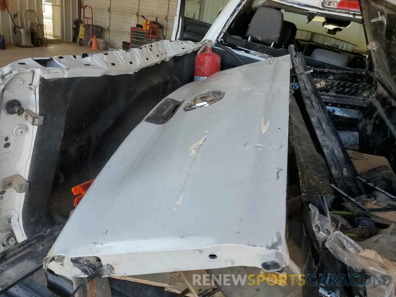 12 Photograph of a damaged car 1C6SRFGT4PN560612 RAM 1500 2023