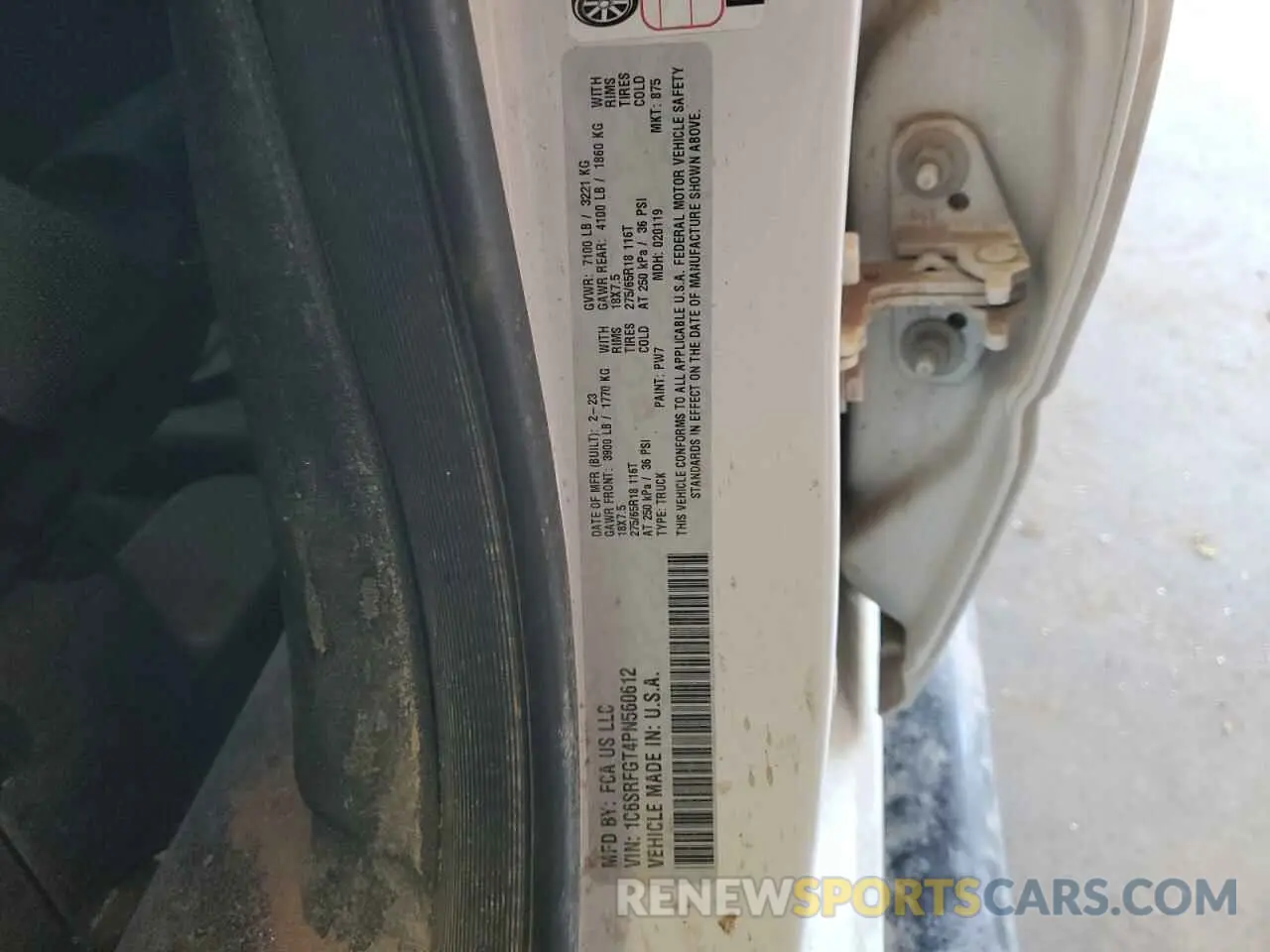 13 Photograph of a damaged car 1C6SRFGT4PN560612 RAM 1500 2023