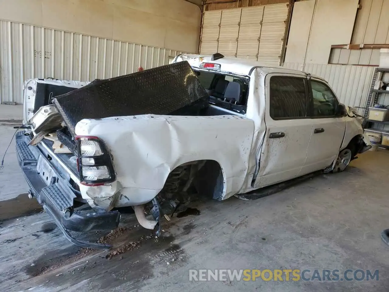 3 Photograph of a damaged car 1C6SRFGT4PN560612 RAM 1500 2023