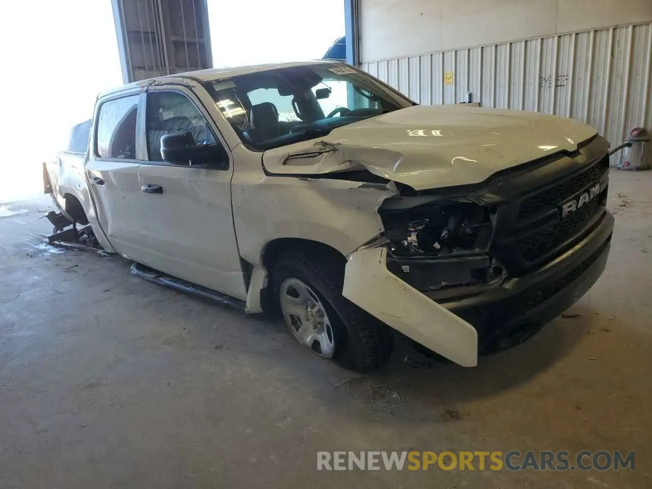 4 Photograph of a damaged car 1C6SRFGT4PN560612 RAM 1500 2023