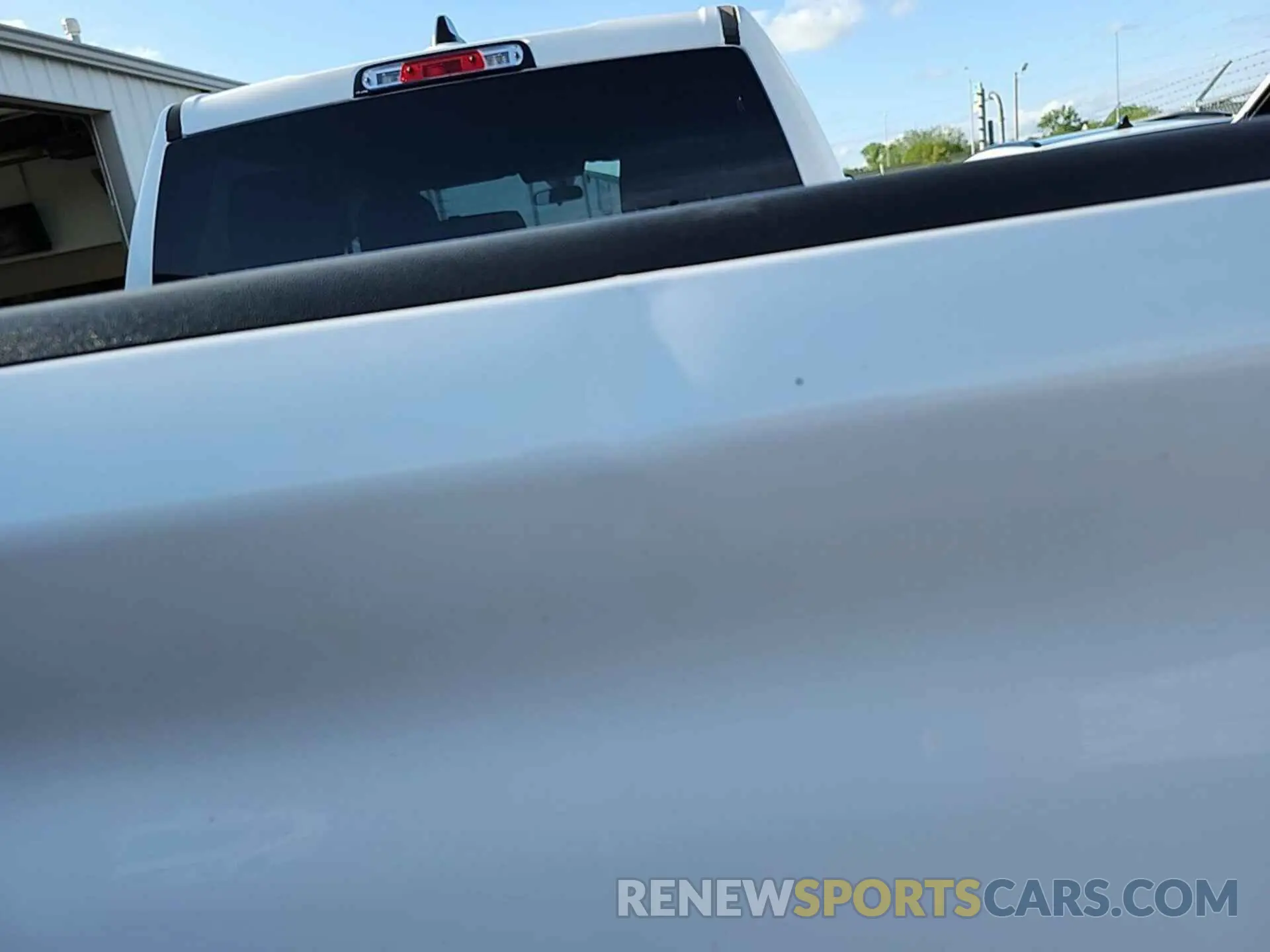 7 Photograph of a damaged car 1C6SRFGT4PN560948 RAM 1500 2023