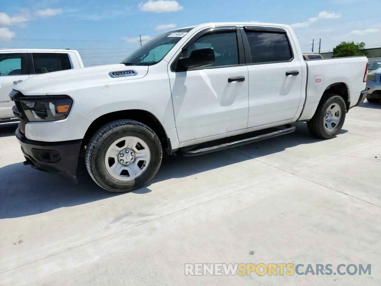 1 Photograph of a damaged car 1C6SRFGT5PN586426 RAM 1500 2023