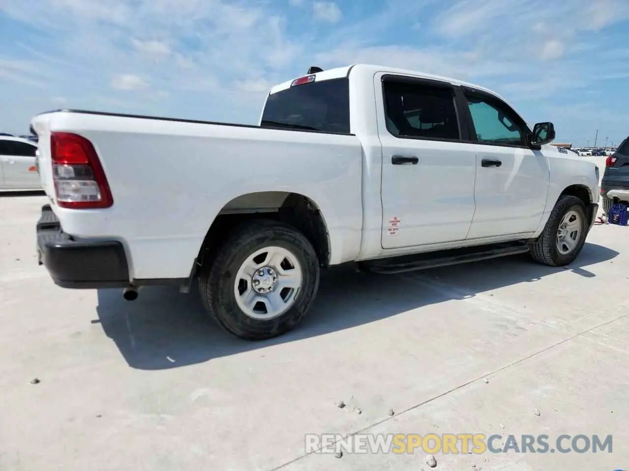 3 Photograph of a damaged car 1C6SRFGT5PN586426 RAM 1500 2023