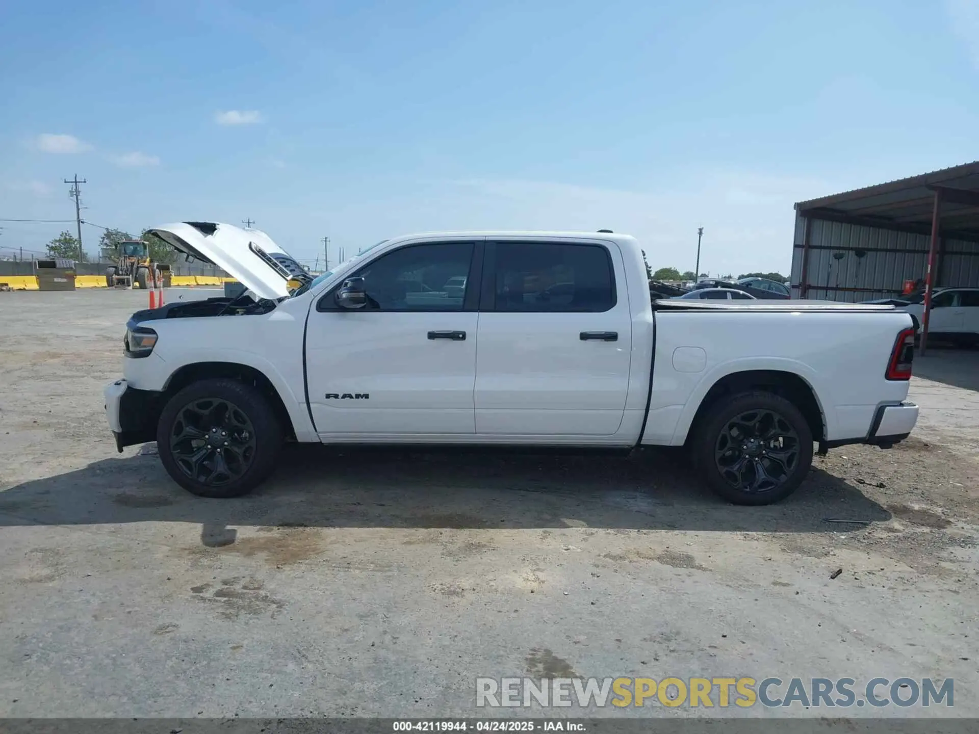 14 Photograph of a damaged car 1C6SRFHT0PN581813 RAM 1500 2023