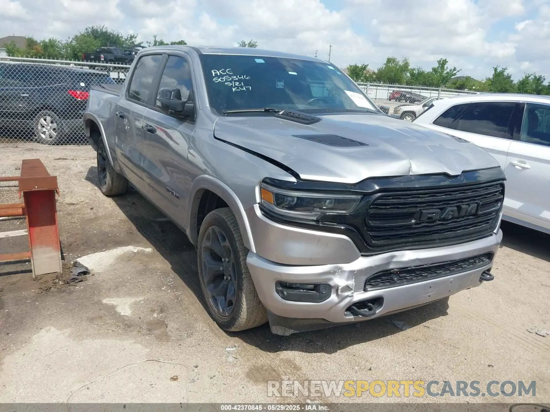1 Photograph of a damaged car 1C6SRFHT0PN600943 RAM 1500 2023