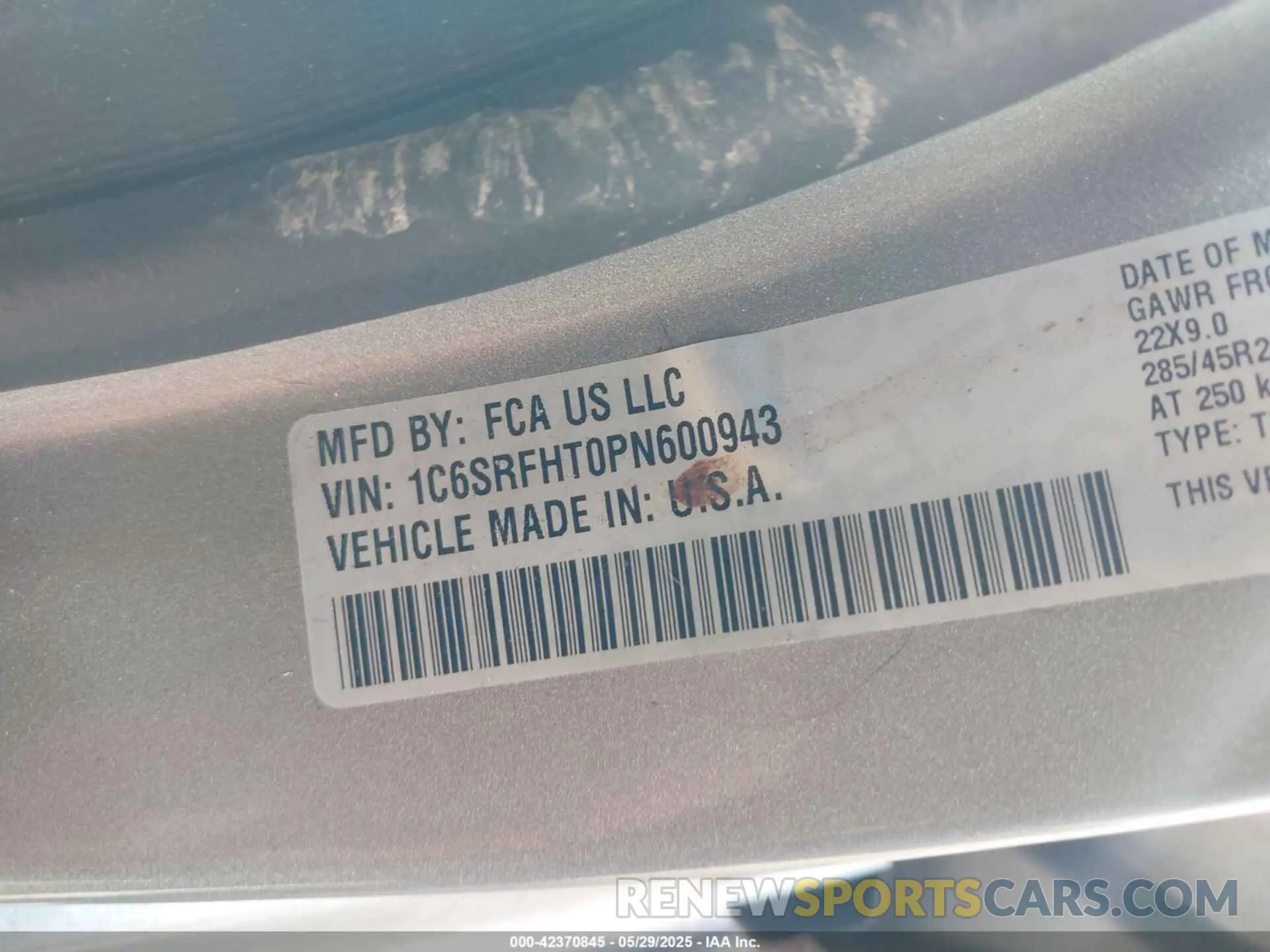 9 Photograph of a damaged car 1C6SRFHT0PN600943 RAM 1500 2023