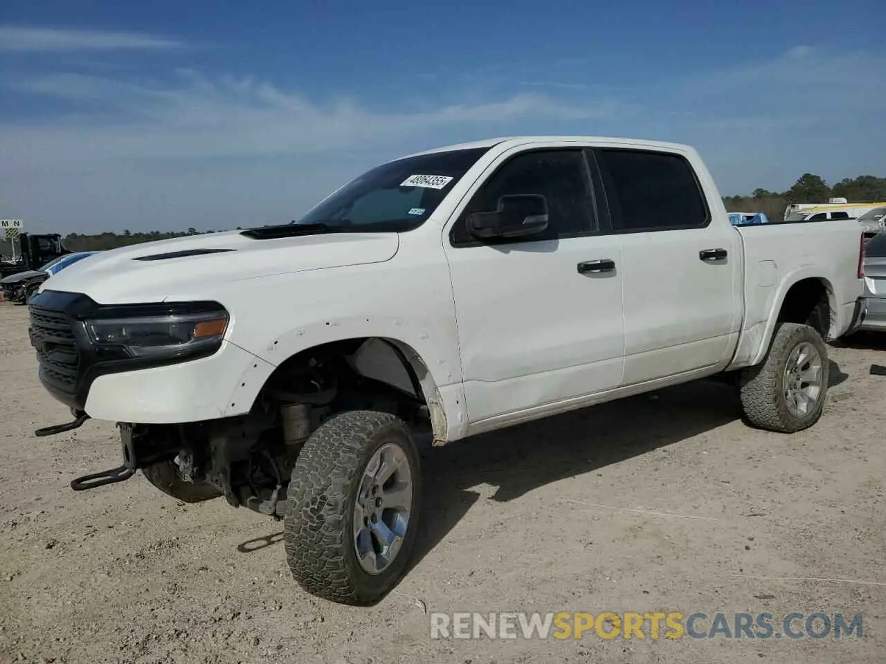 1 Photograph of a damaged car 1C6SRFHT1PN576104 RAM 1500 2023