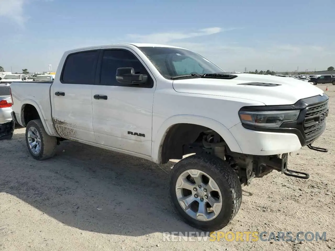 4 Photograph of a damaged car 1C6SRFHT1PN576104 RAM 1500 2023