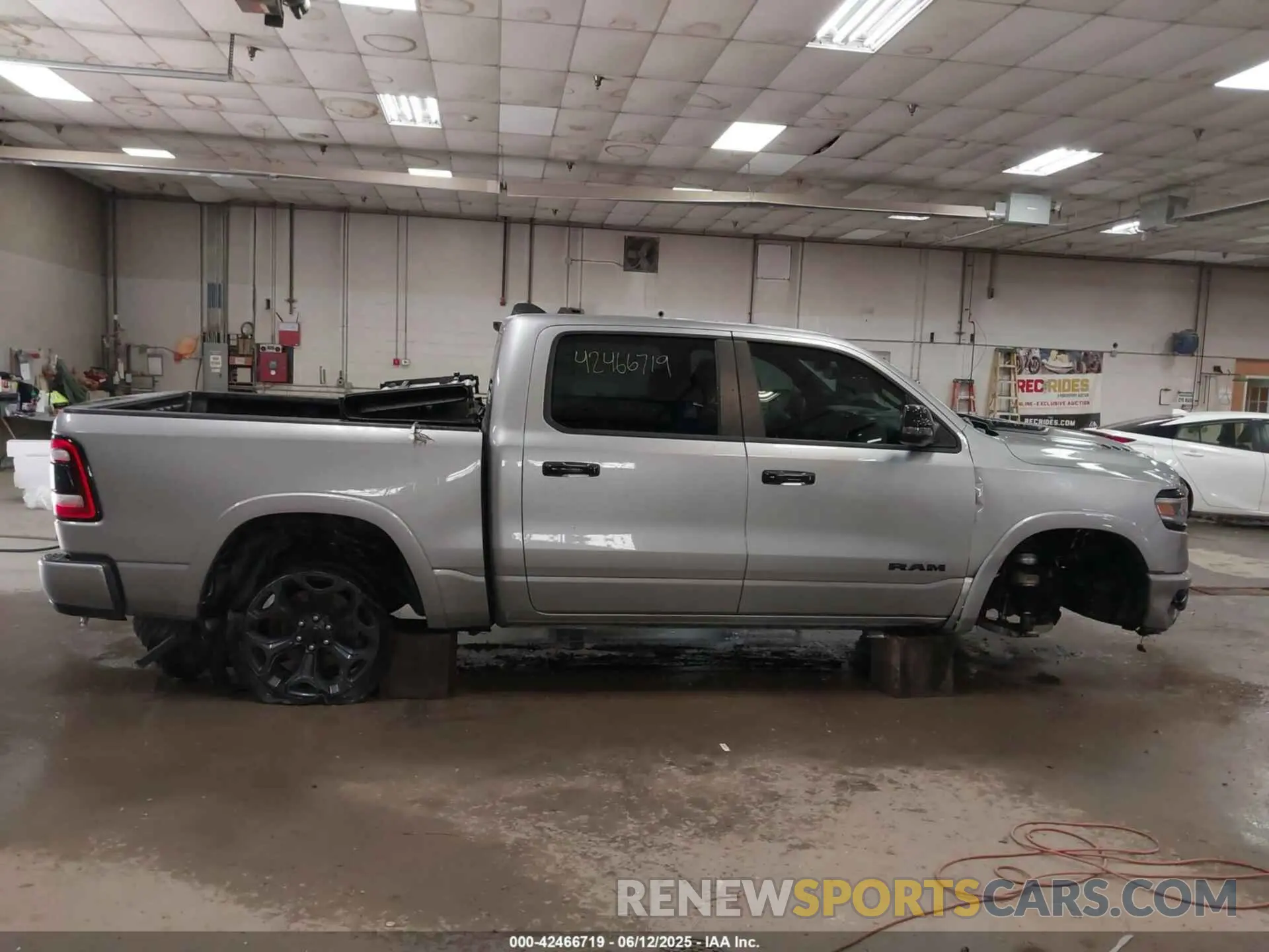 14 Photograph of a damaged car 1C6SRFHT1PN639153 RAM 1500 2023