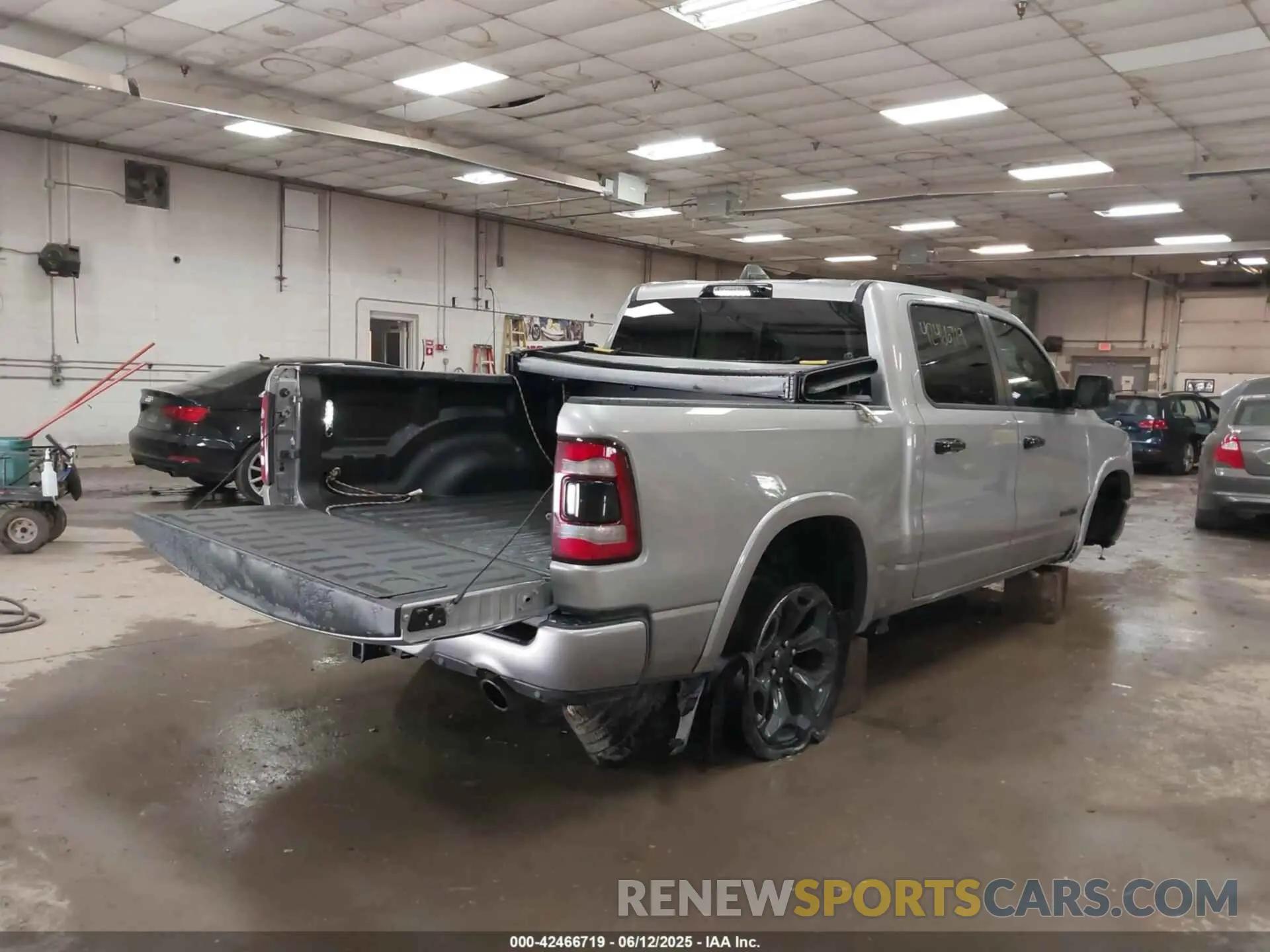 4 Photograph of a damaged car 1C6SRFHT1PN639153 RAM 1500 2023