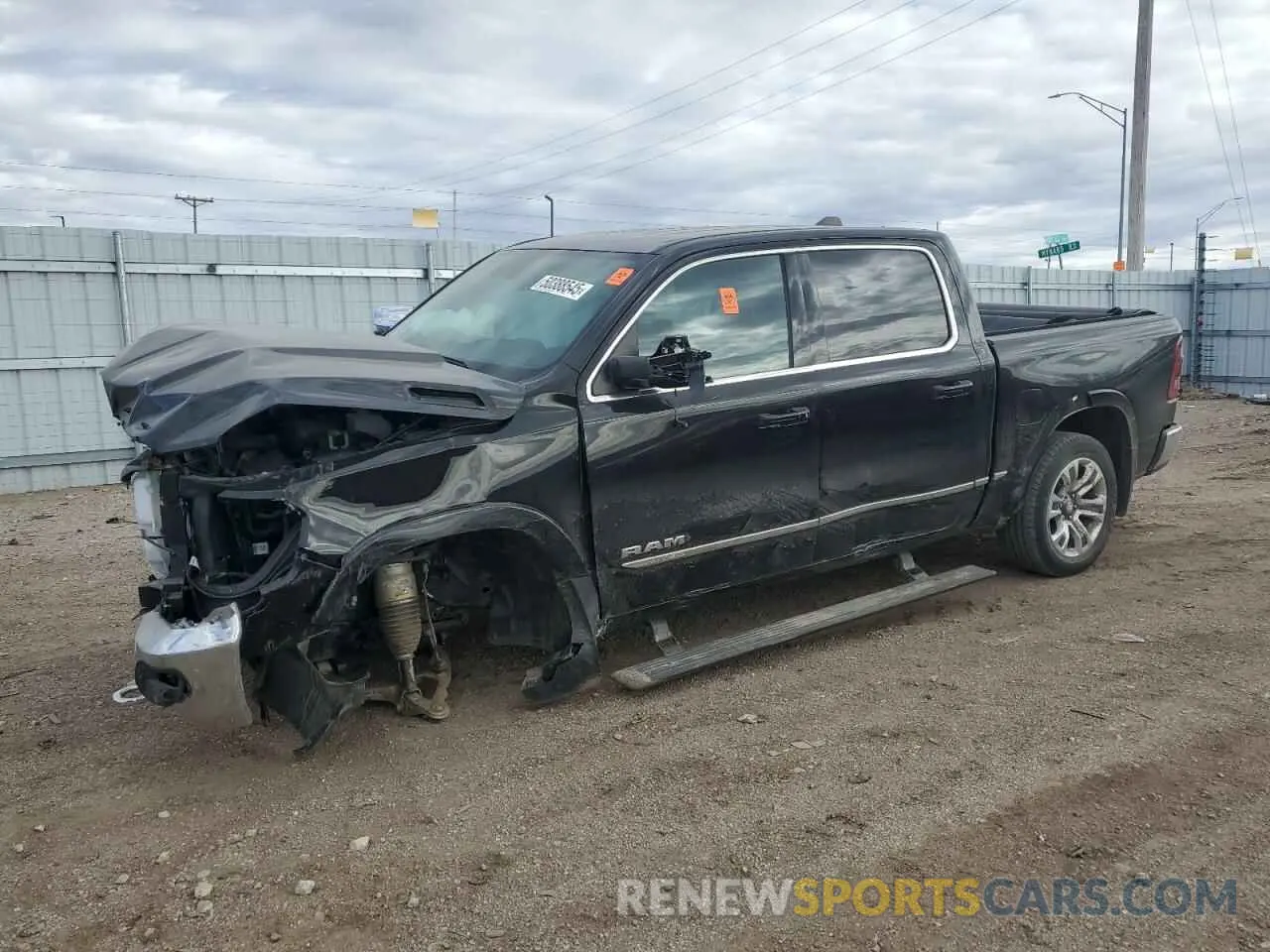 1 Photograph of a damaged car 1C6SRFHT3PN610799 RAM 1500 2023