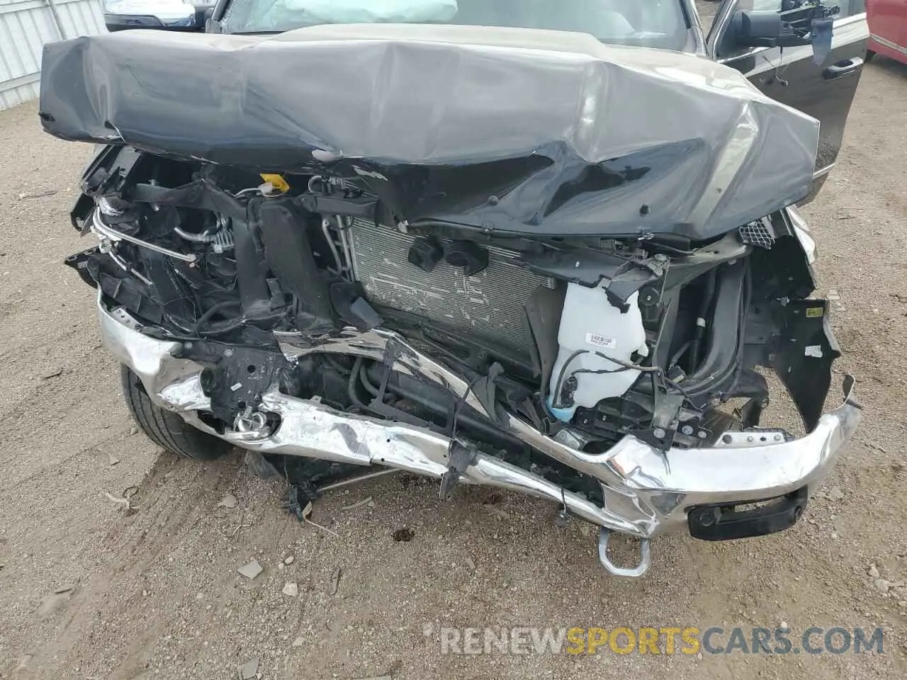 11 Photograph of a damaged car 1C6SRFHT3PN610799 RAM 1500 2023