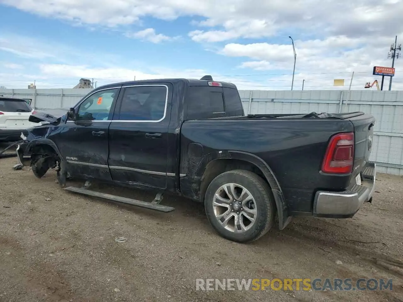 2 Photograph of a damaged car 1C6SRFHT3PN610799 RAM 1500 2023