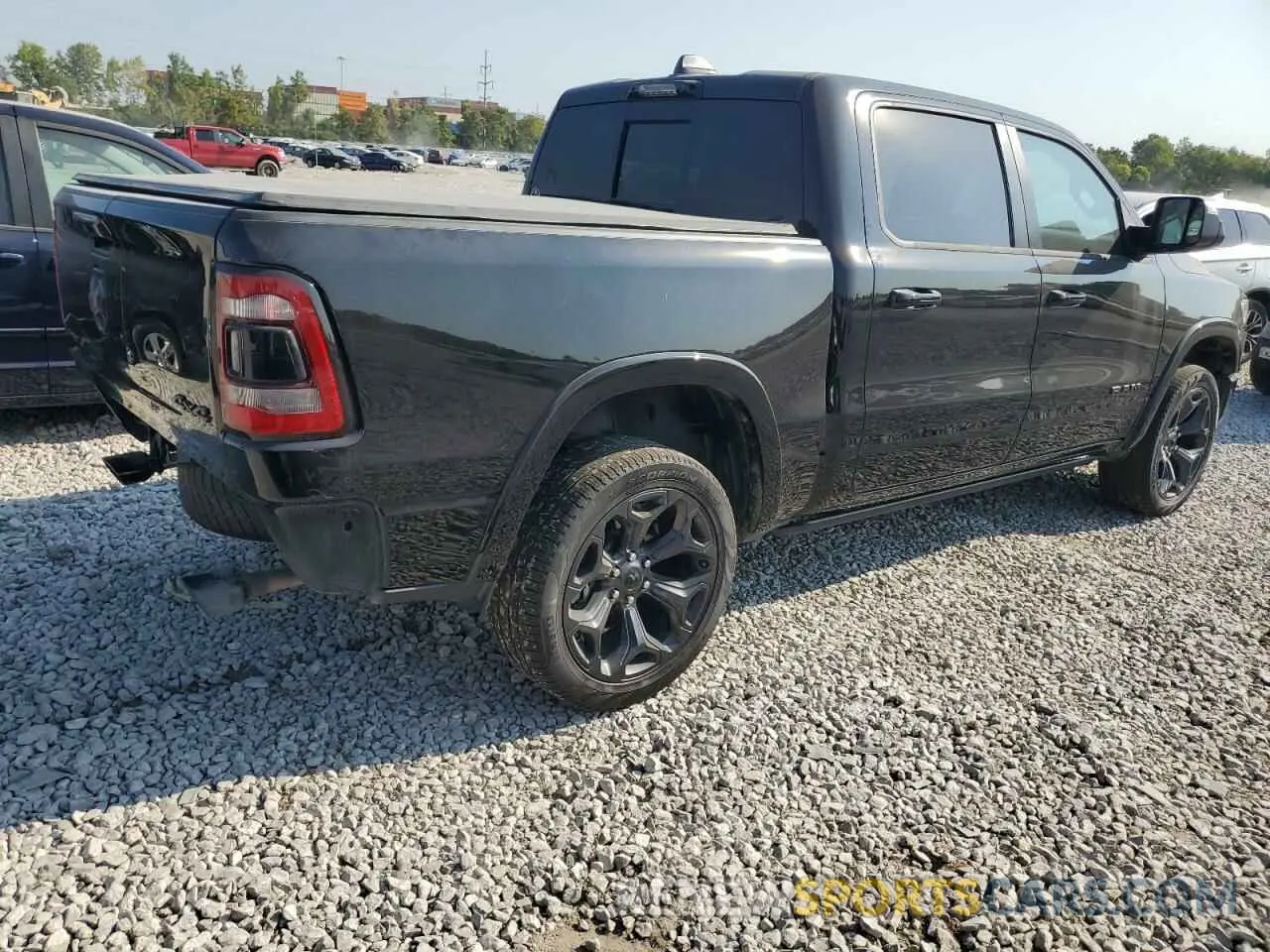 3 Photograph of a damaged car 1C6SRFHT4PN682692 RAM 1500 2023