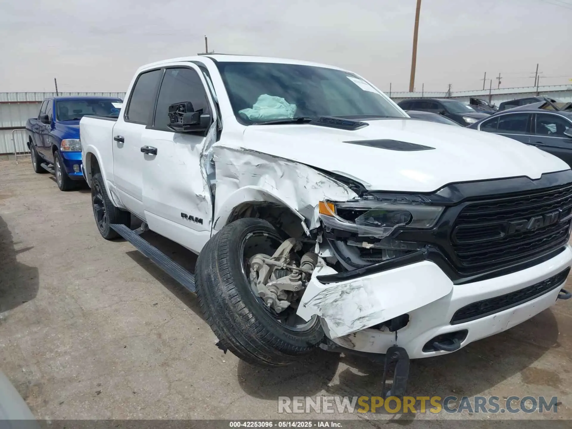 1 Photograph of a damaged car 1C6SRFHT5PN576378 RAM 1500 2023