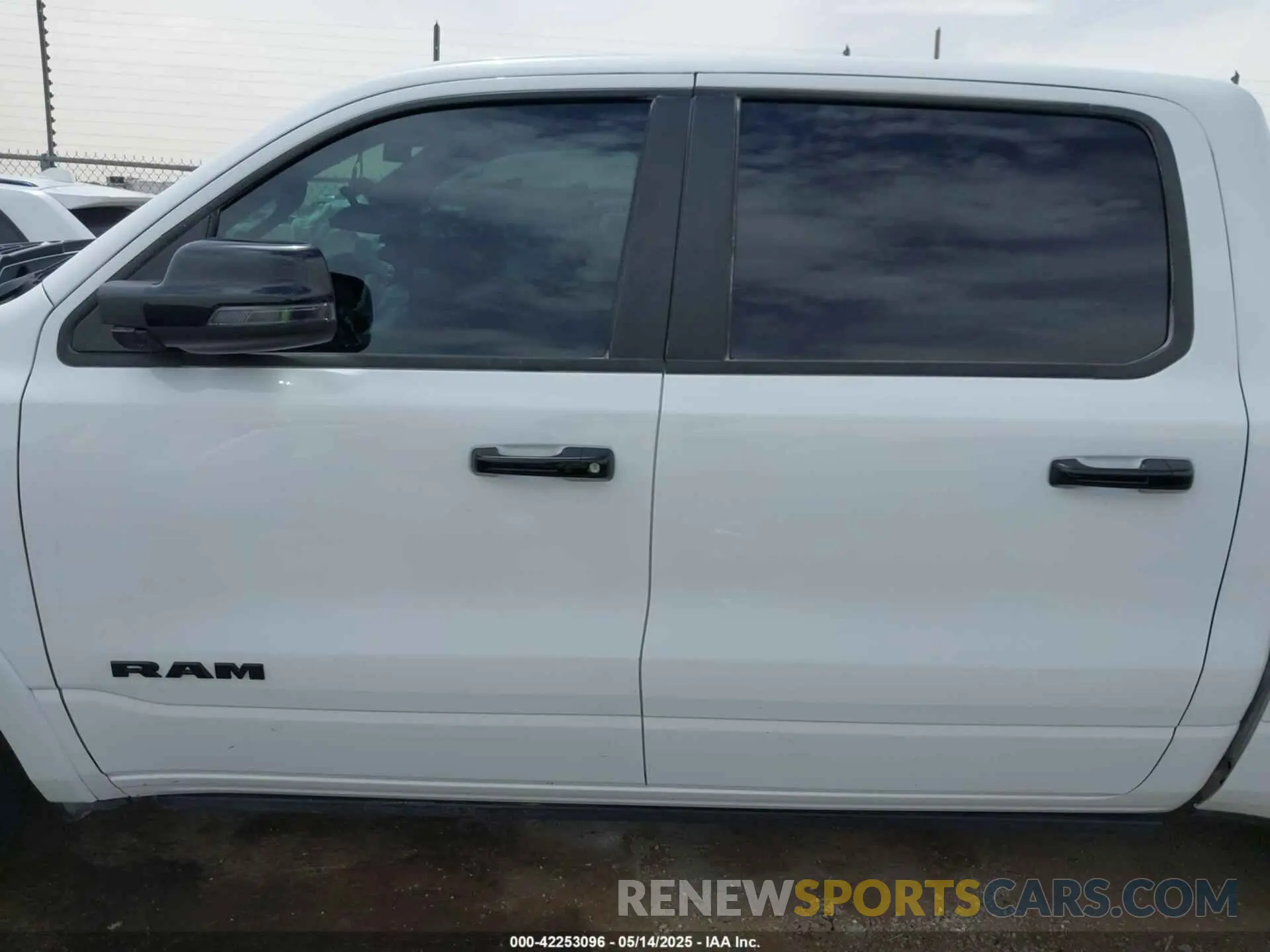 13 Photograph of a damaged car 1C6SRFHT5PN576378 RAM 1500 2023