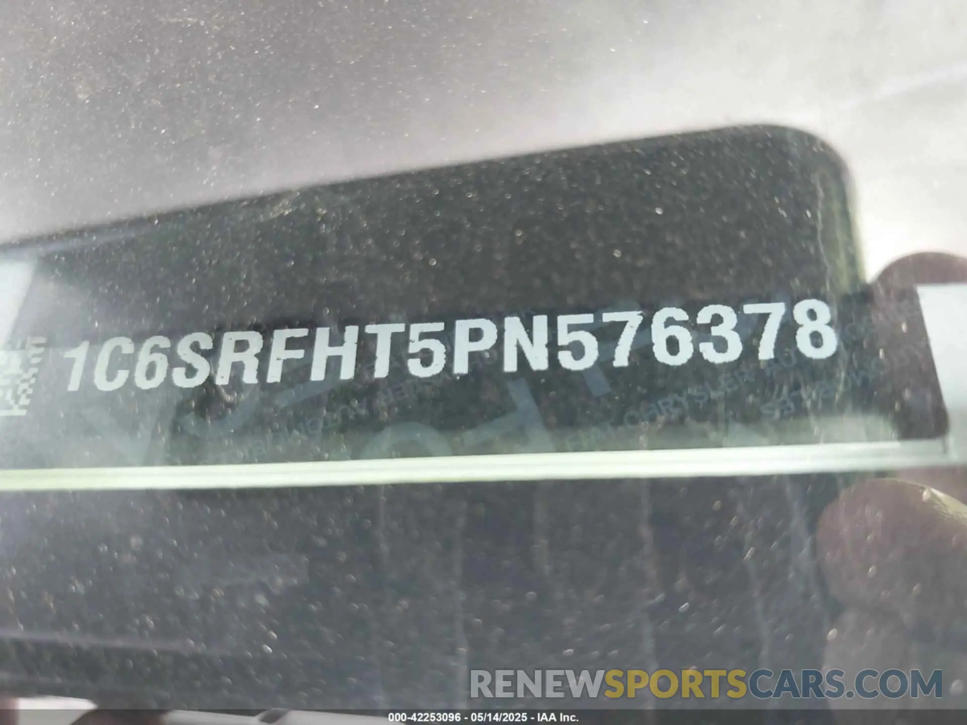 9 Photograph of a damaged car 1C6SRFHT5PN576378 RAM 1500 2023