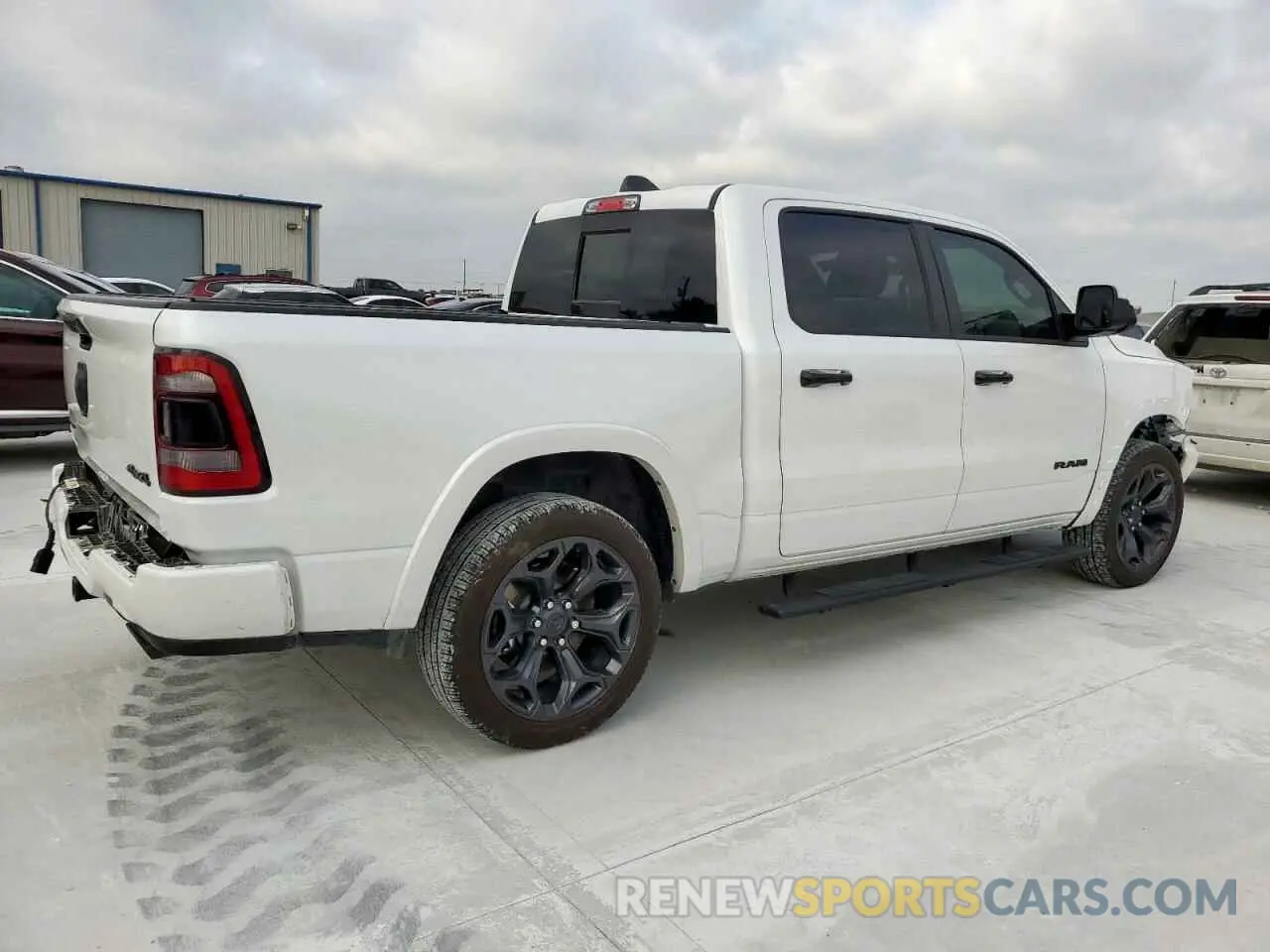 3 Photograph of a damaged car 1C6SRFHT7PN564426 RAM 1500 2023