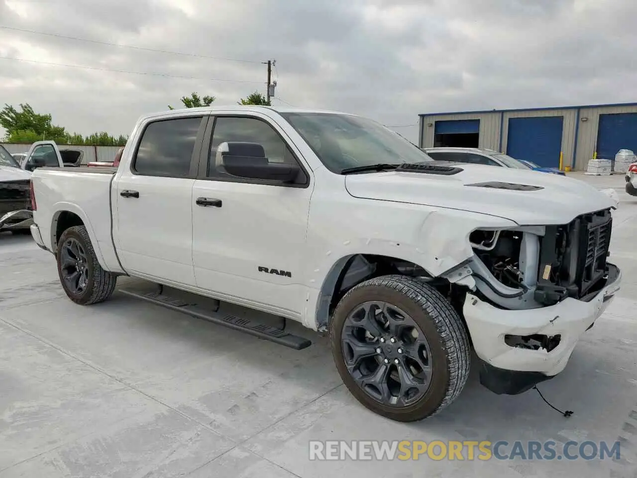 4 Photograph of a damaged car 1C6SRFHT7PN564426 RAM 1500 2023