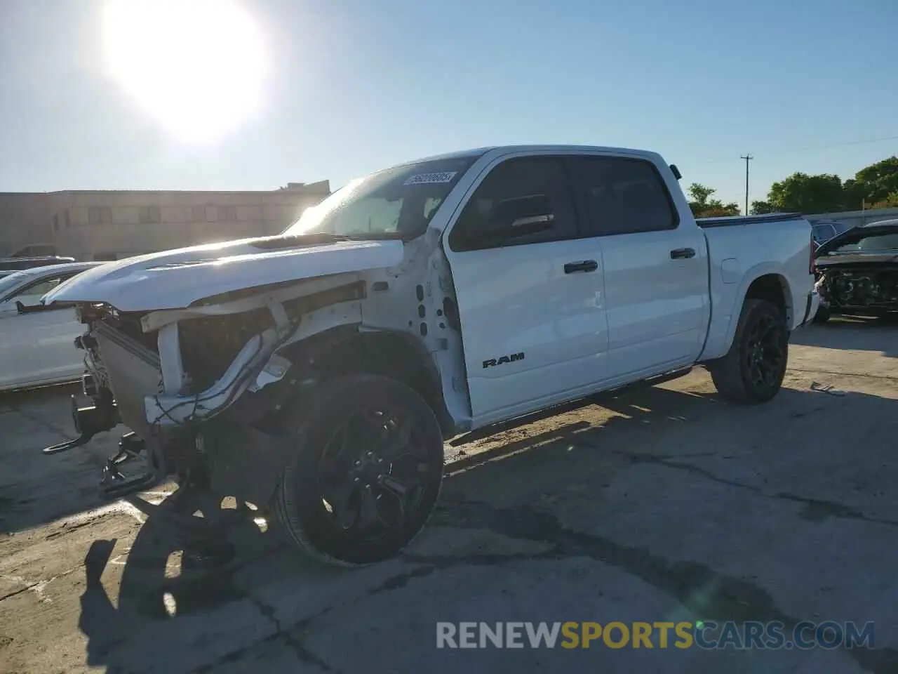 1 Photograph of a damaged car 1C6SRFHT7PN671931 RAM 1500 2023