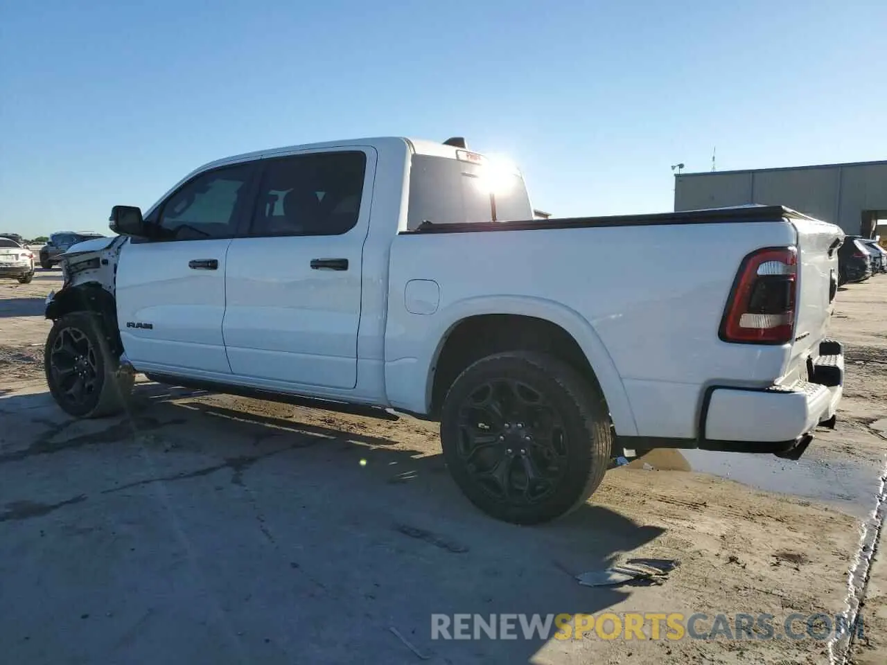 2 Photograph of a damaged car 1C6SRFHT7PN671931 RAM 1500 2023